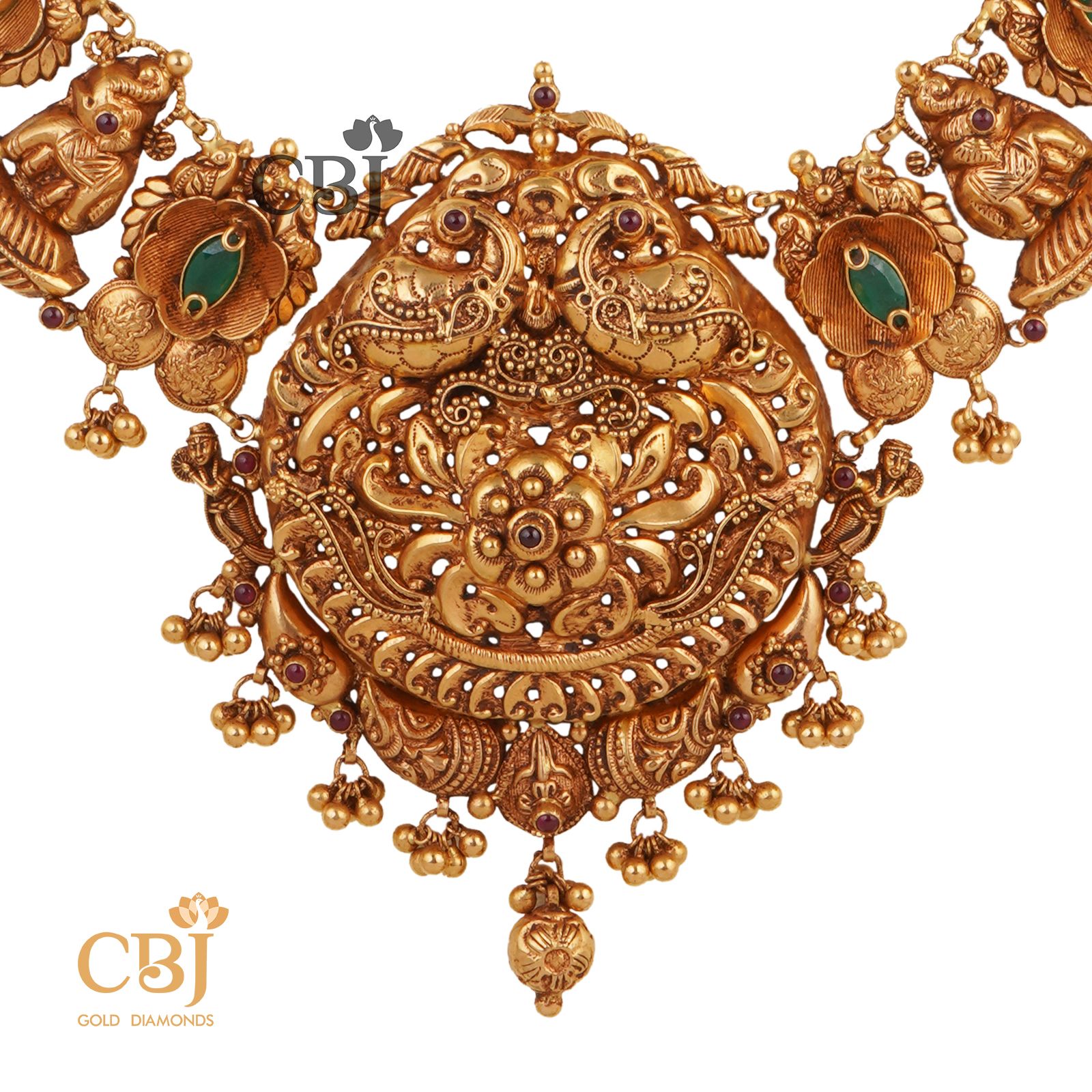Deep nakas haram studded with emerald stones featuring elephant motifs.