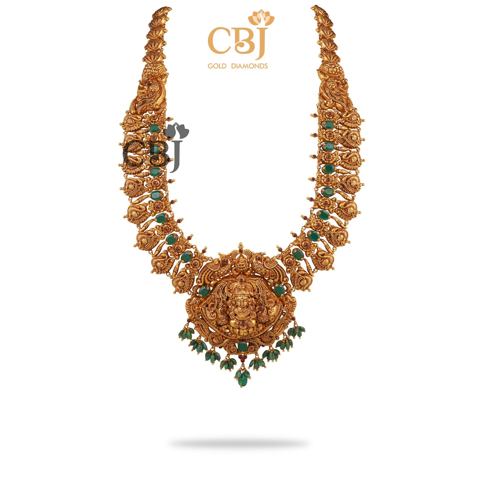 A traditional royal nakas U-Haram studded with emerald stones.