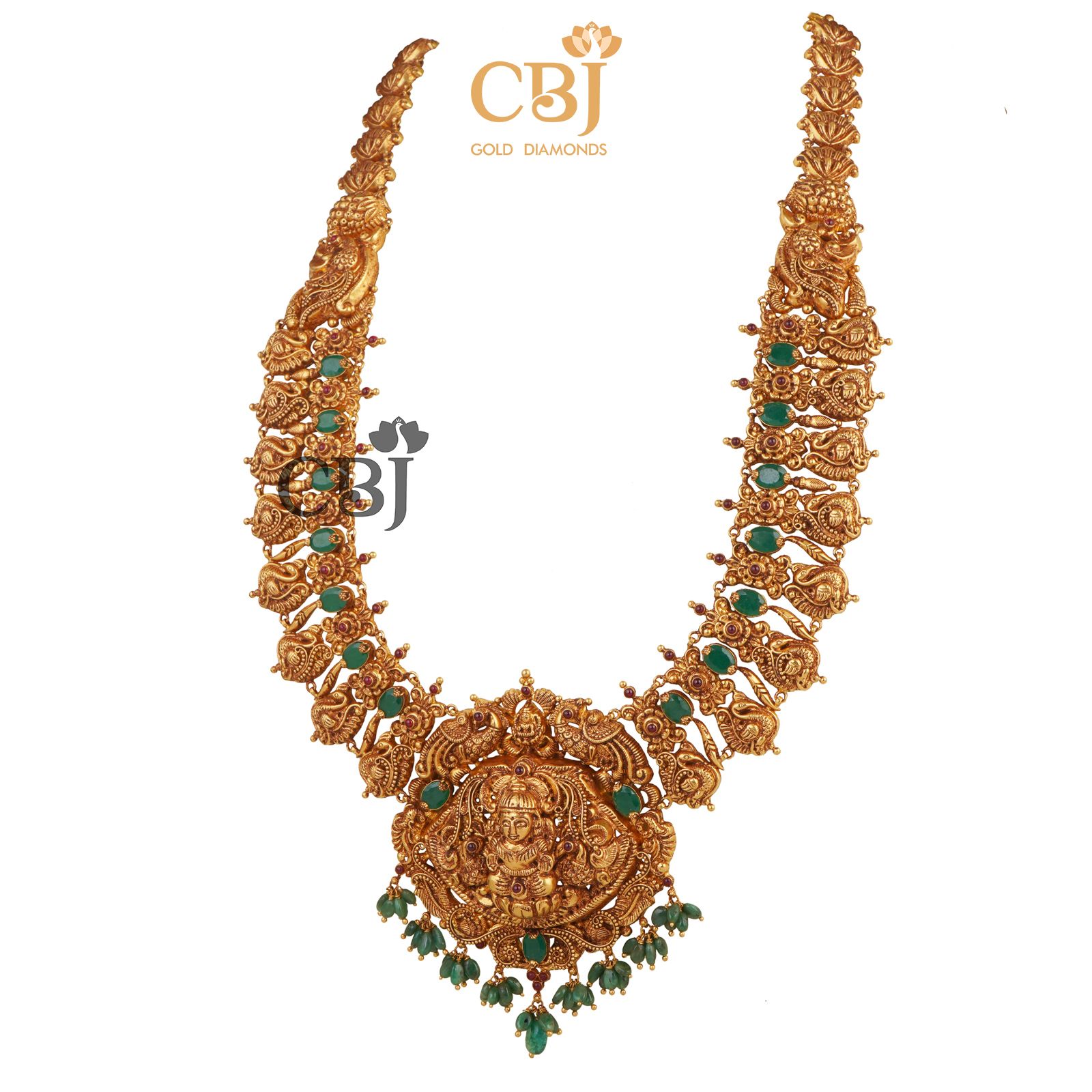 A traditional royal nakas U-Haram studded with emerald stones.