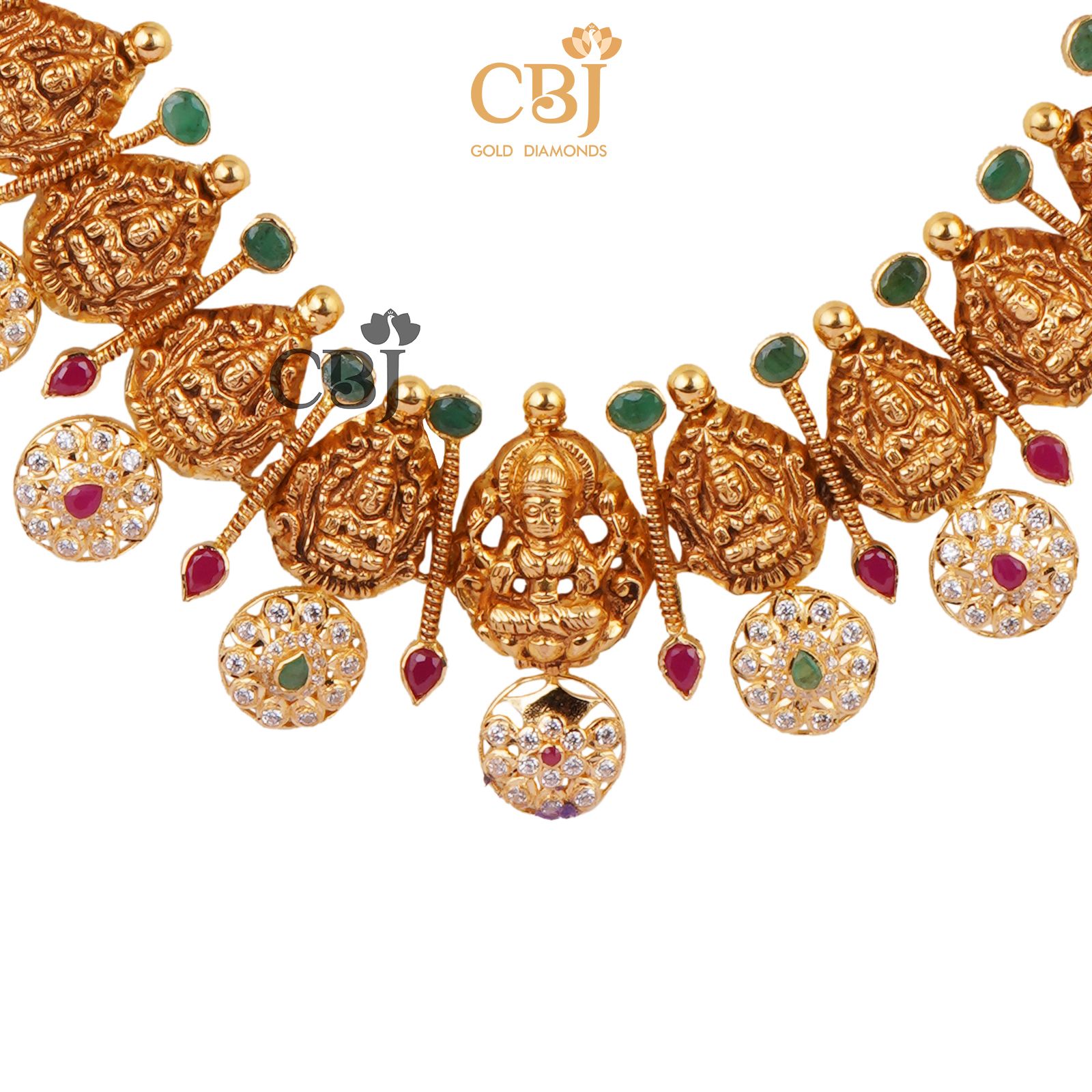 A unique CZ pachi bottumala studded with ruby and emerald potas.