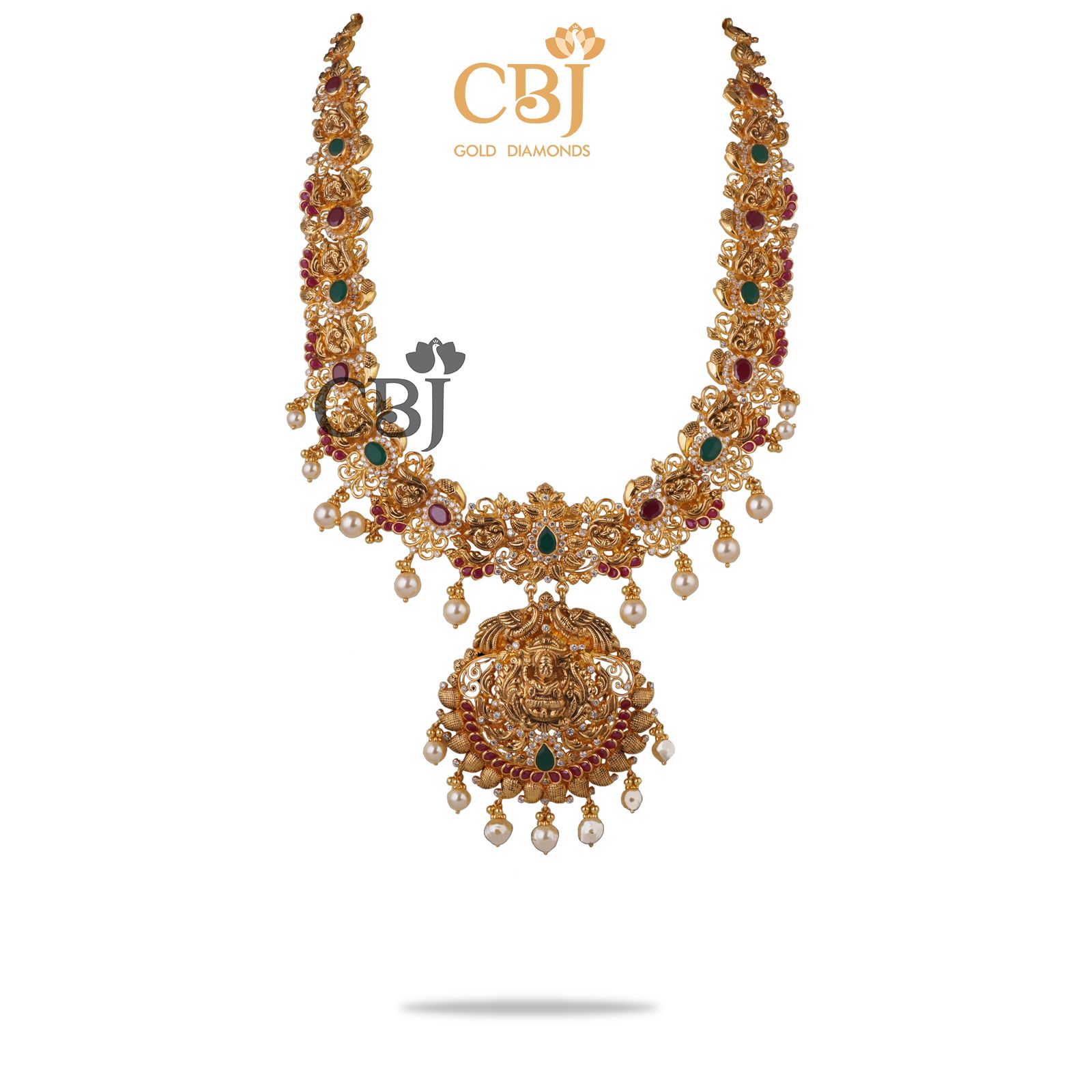 A light weight classic designer U- haram featuring  rubies and emeralds.