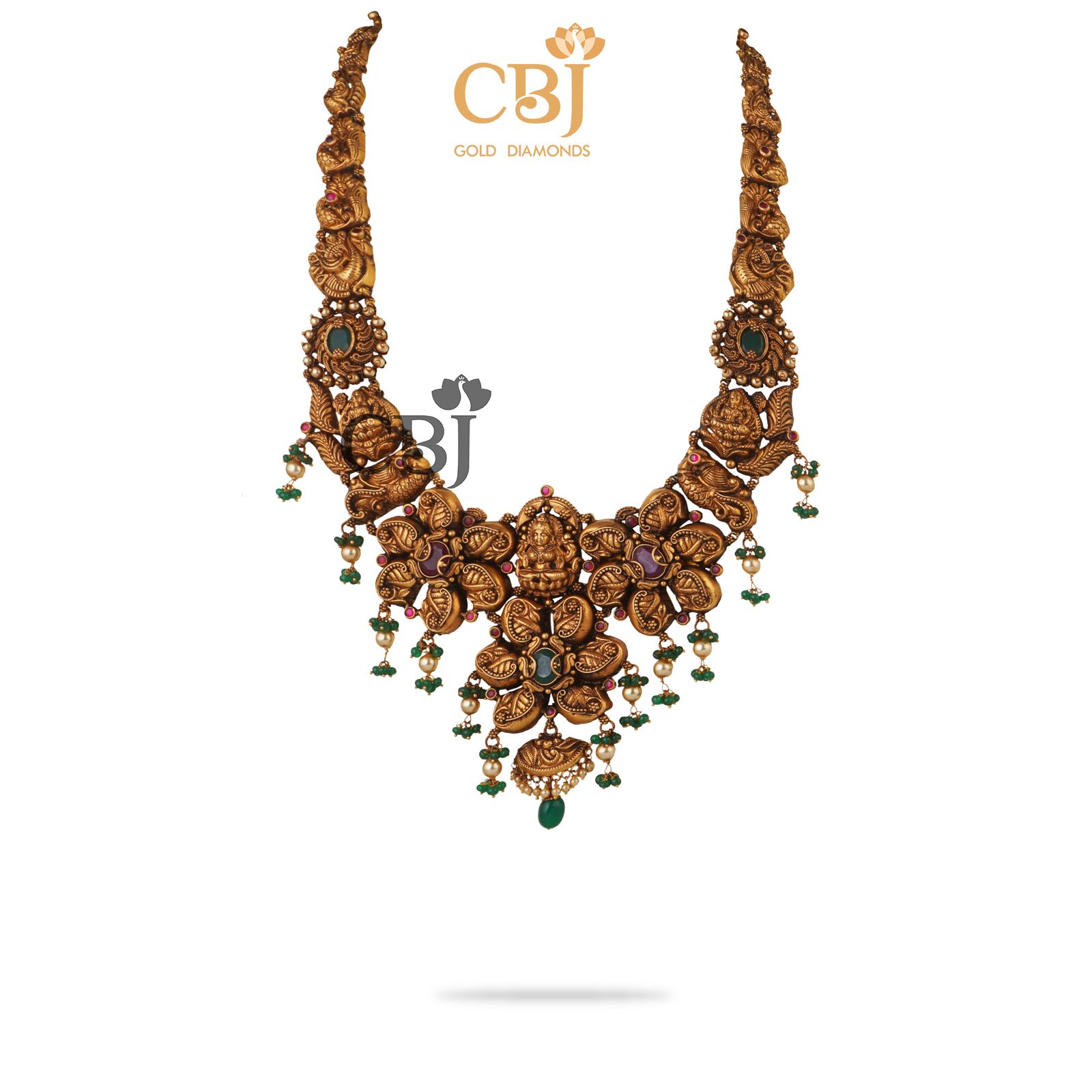 Be a trendsetter with this anique nakas U haram featuring rubies and emeralds.