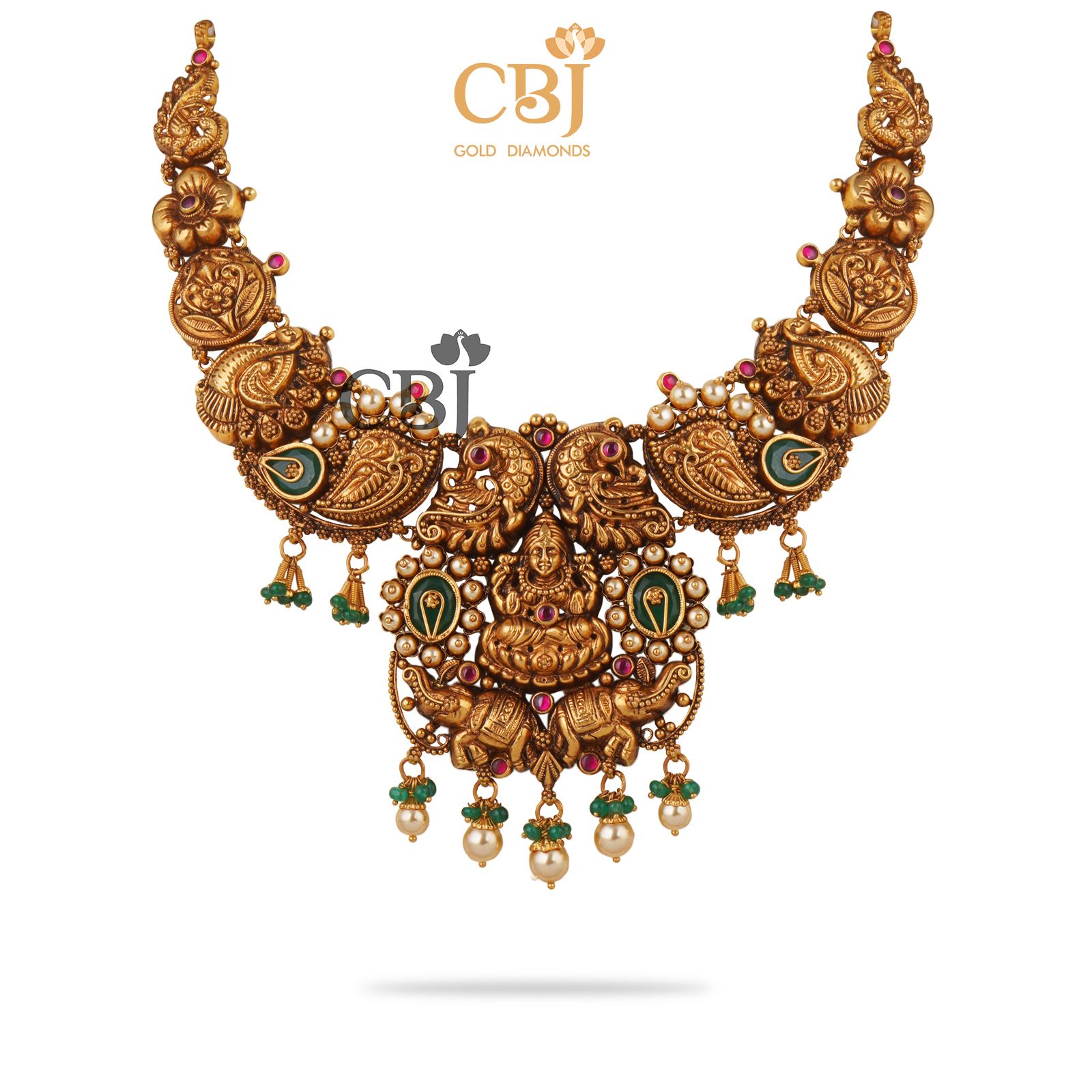 Keeping traditions alive with this simple antique necklace studded with emeralds and pearls.