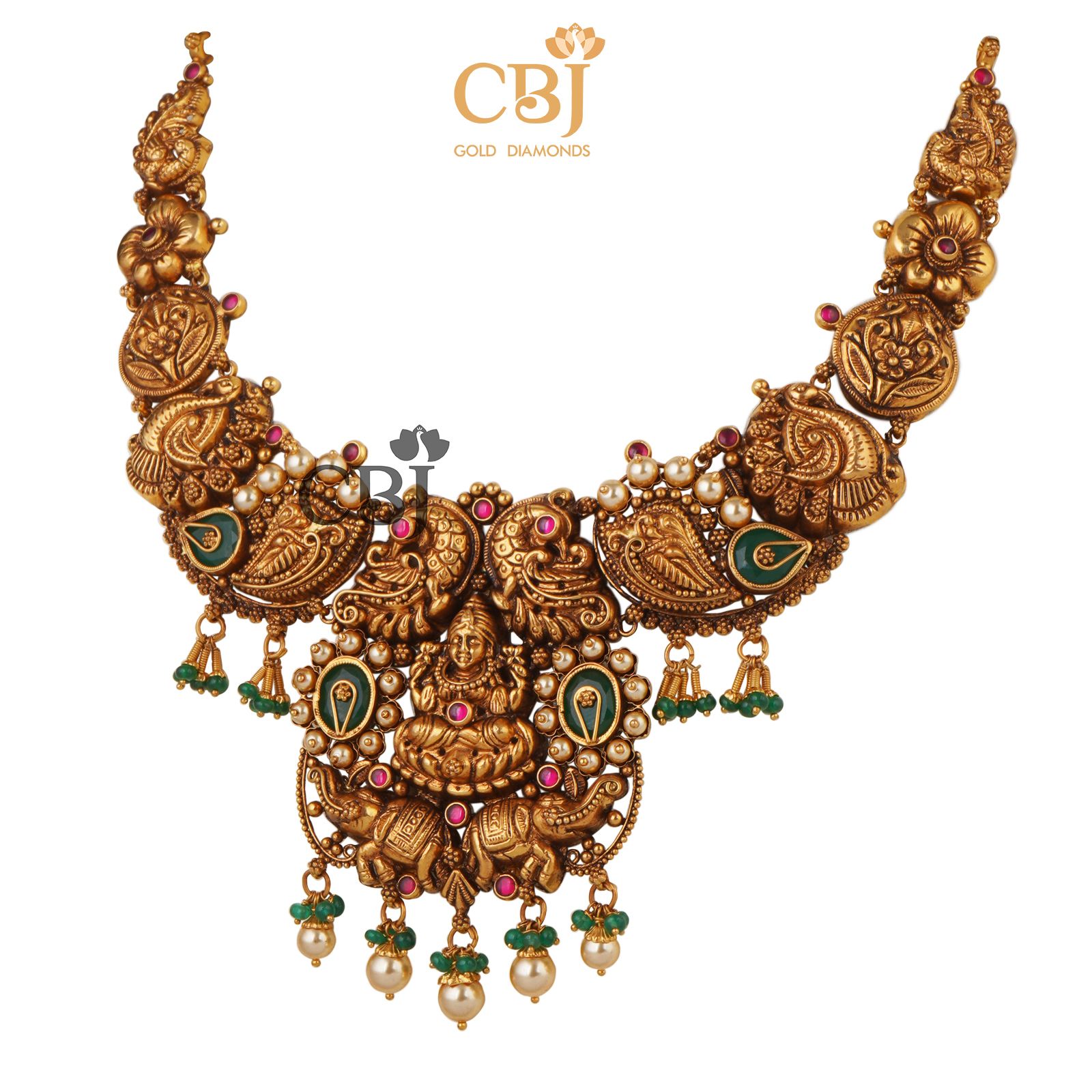 Keeping traditions alive with this simple antique necklace studded with emeralds and pearls.