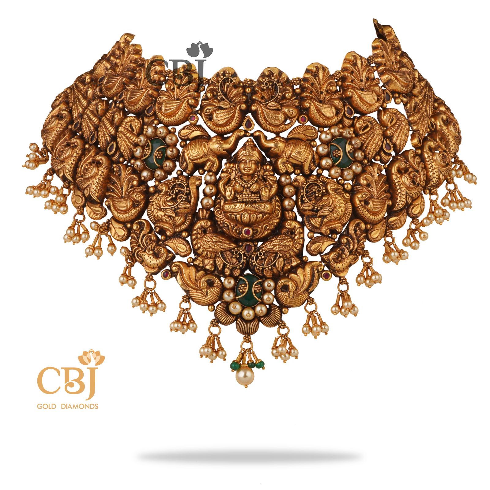 Grandeur at a glance. Nakashi antique choker featuring an elegant bold design with elephant and peacock motifs.