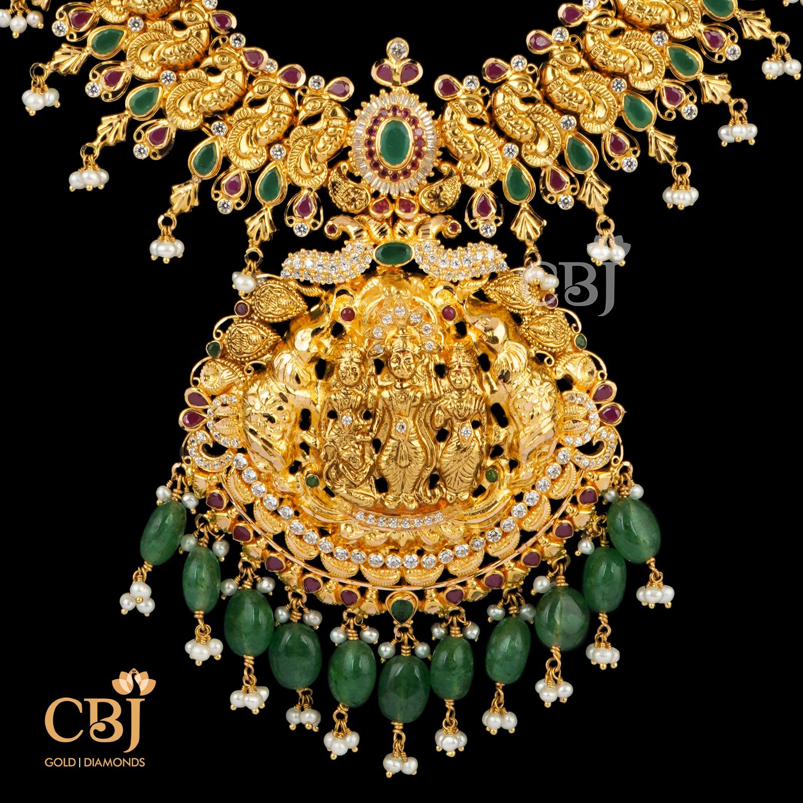Light weight traditional long haram decorated with rubies and emeralds.