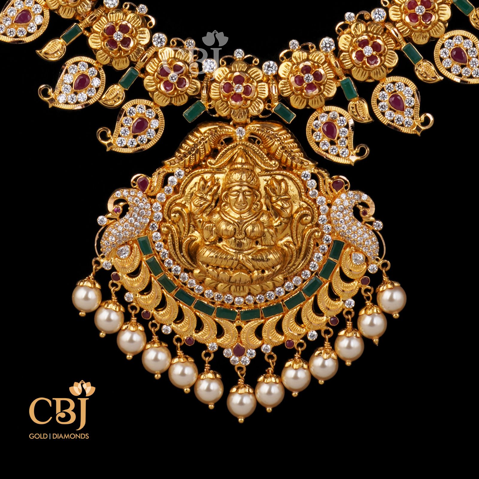 A one of a kind mangomala studded with cz stones and pearls.