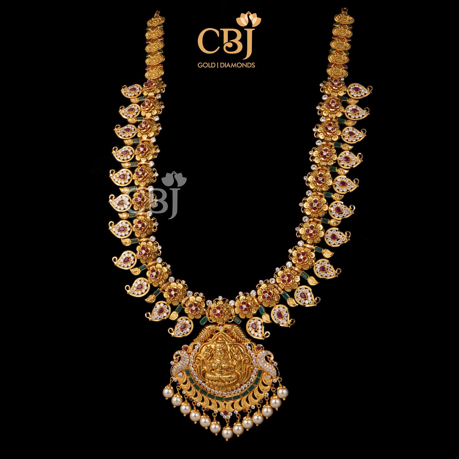 A one of a kind mangomala studded with cz stones and pearls.
