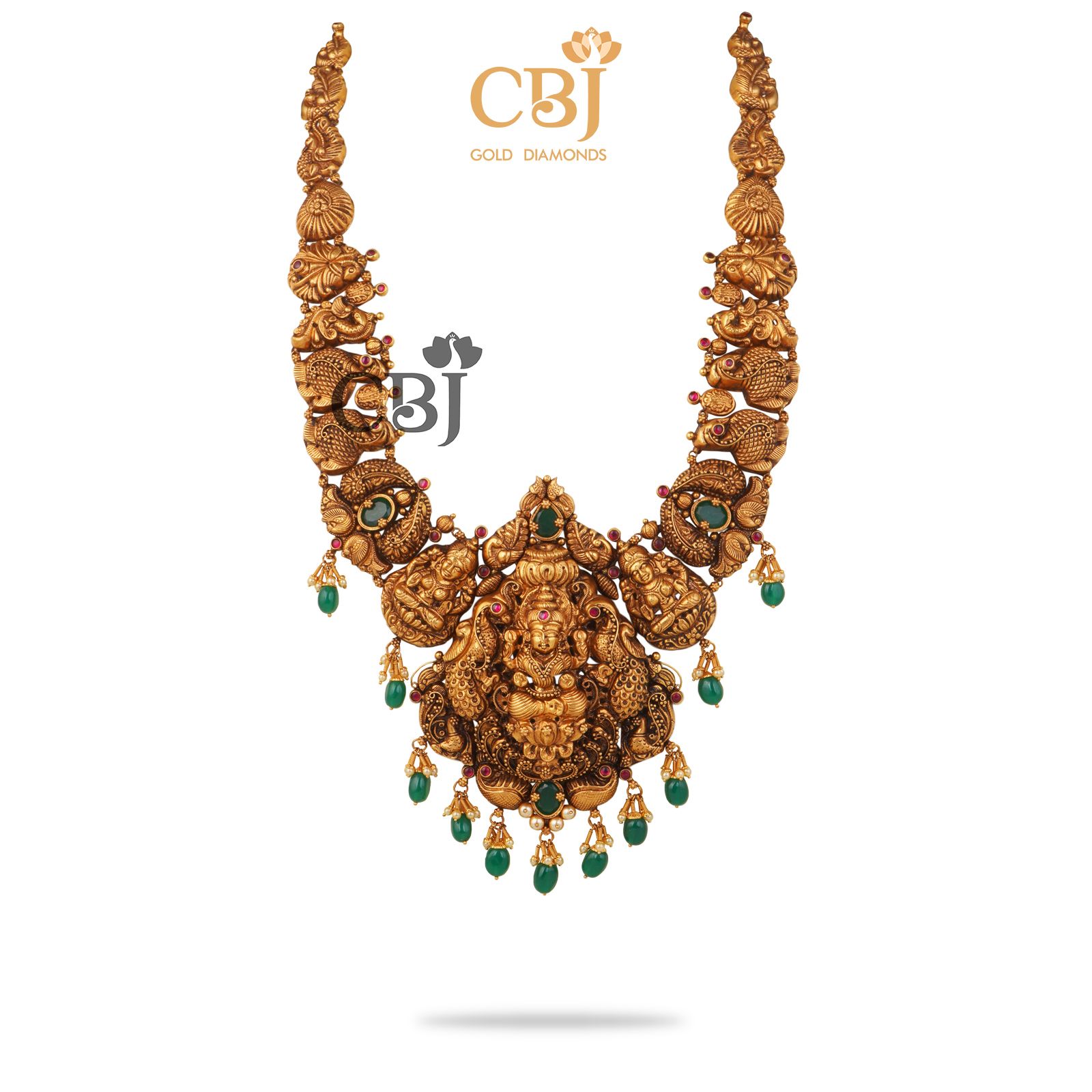 An antique nakashi haram featuring emerald stones and divine motifs.