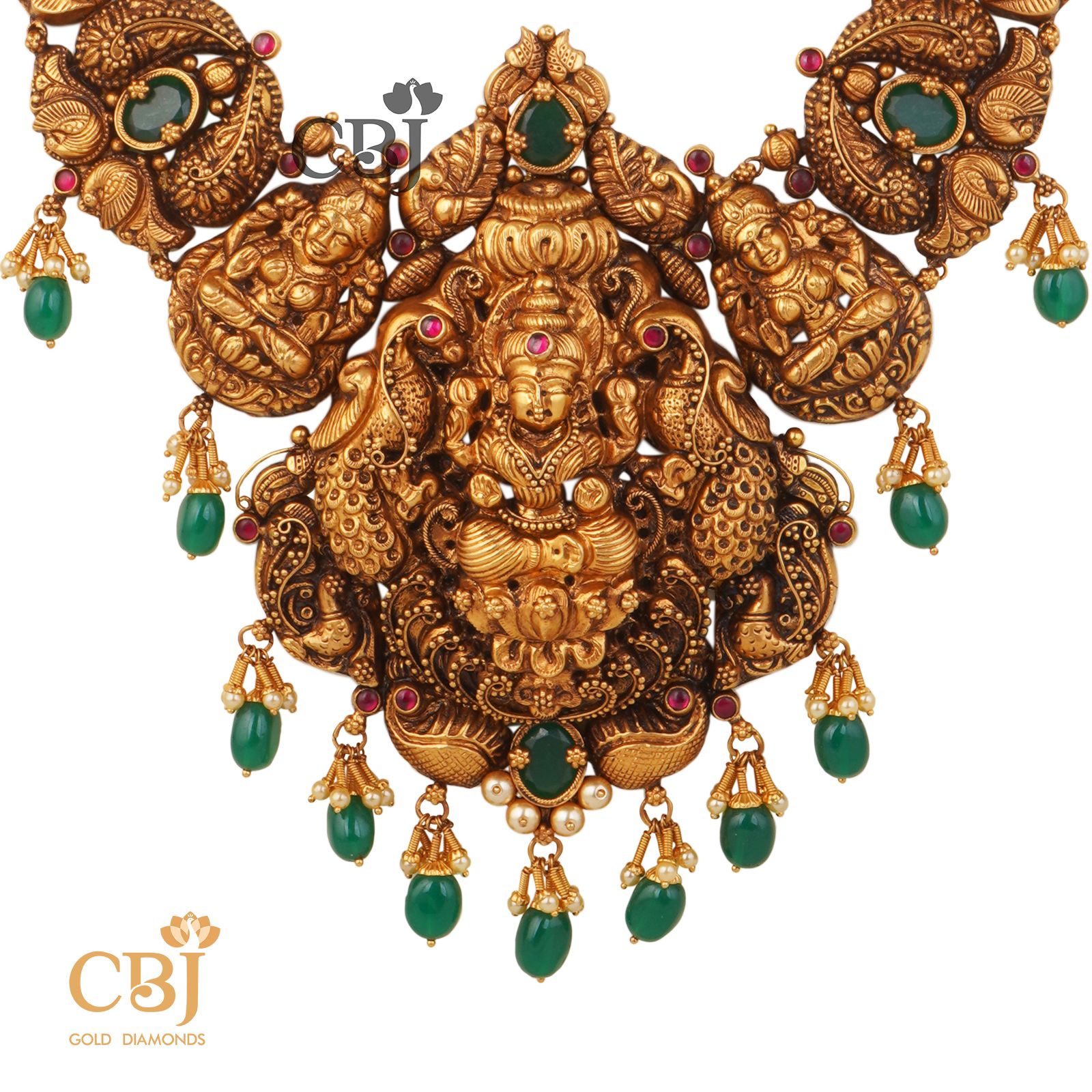 An antique nakashi haram featuring emerald stones and divine motifs.