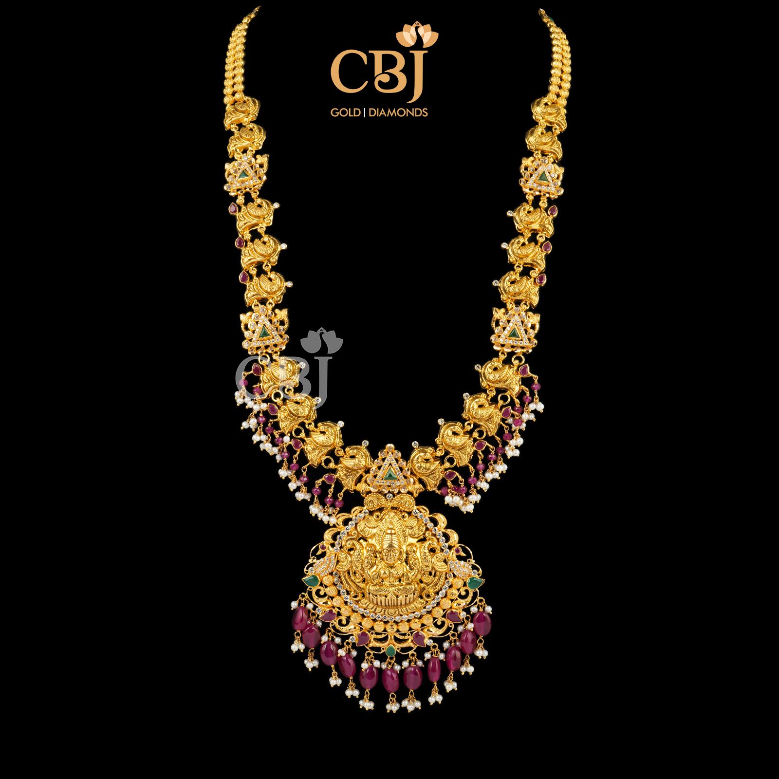 Light weight long haram featuring rubies and micro-pearls.