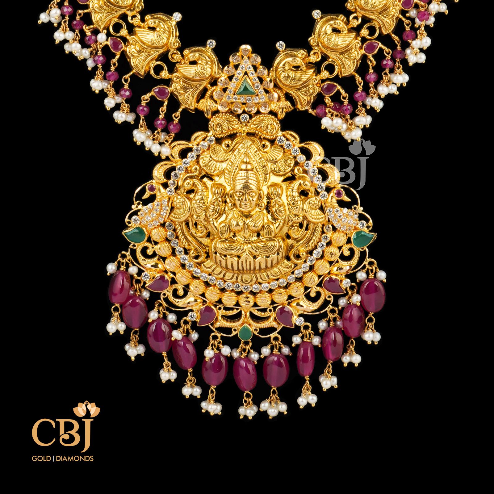 Light weight long haram featuring rubies and micro-pearls.