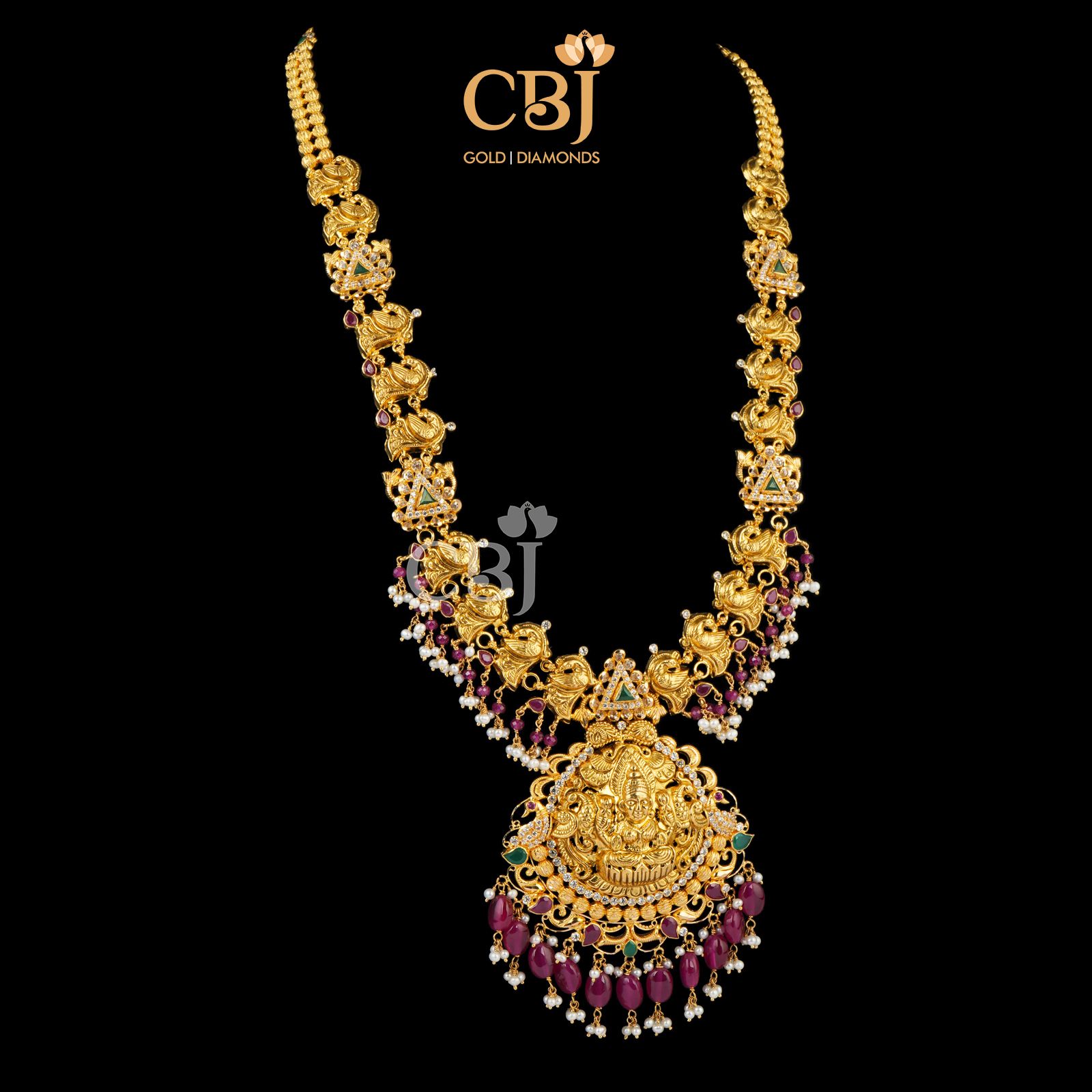 Light weight long haram featuring rubies and micro-pearls.