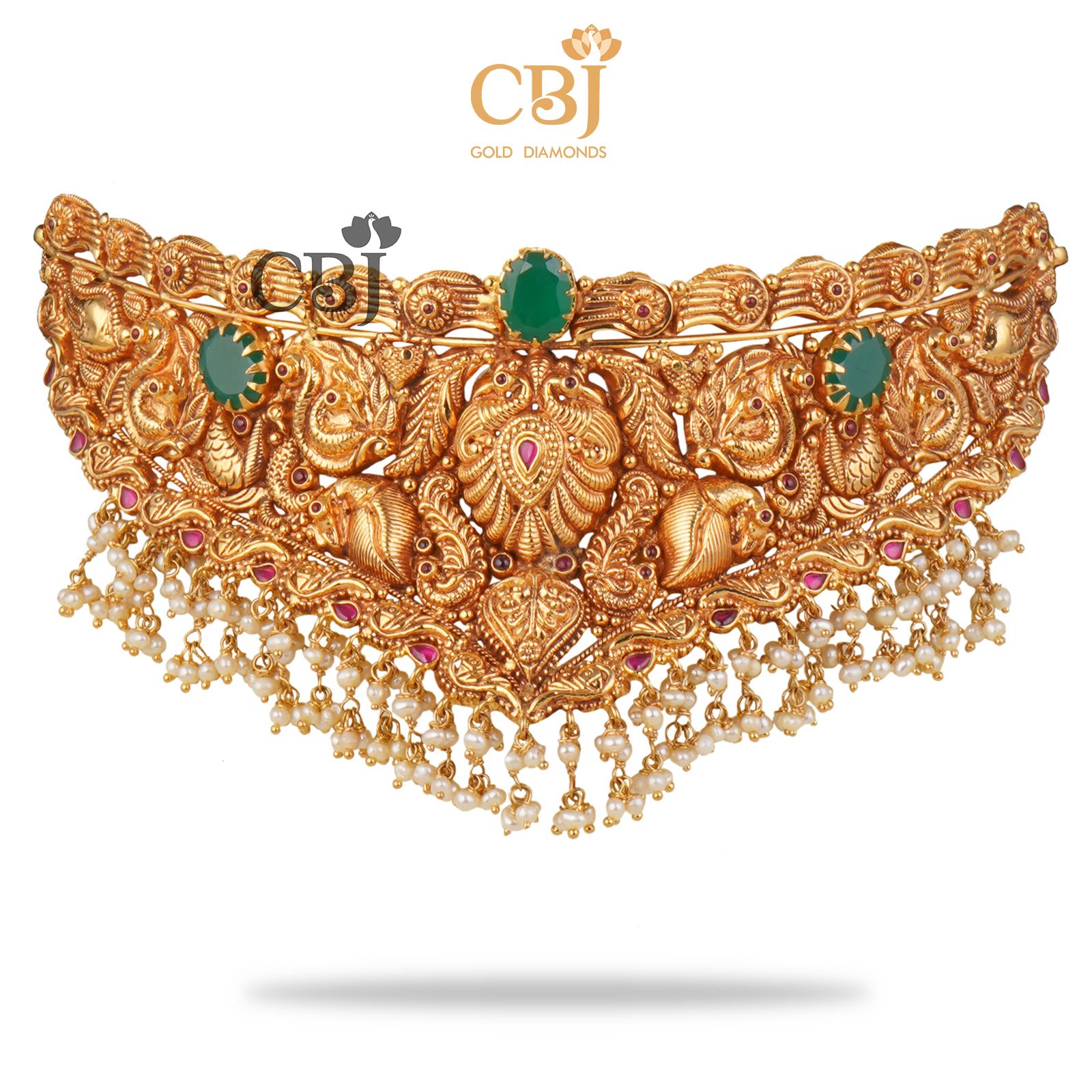 An antique nakashi choker featuring emerald stones and suspended micro-pearls.