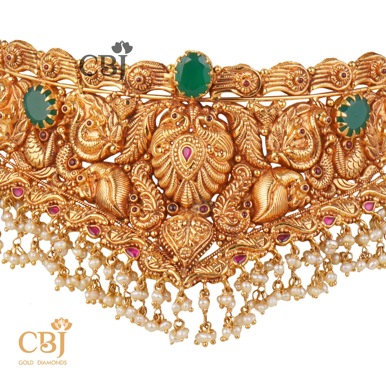An antique nakashi choker featuring emerald stones and suspended micro-pearls.