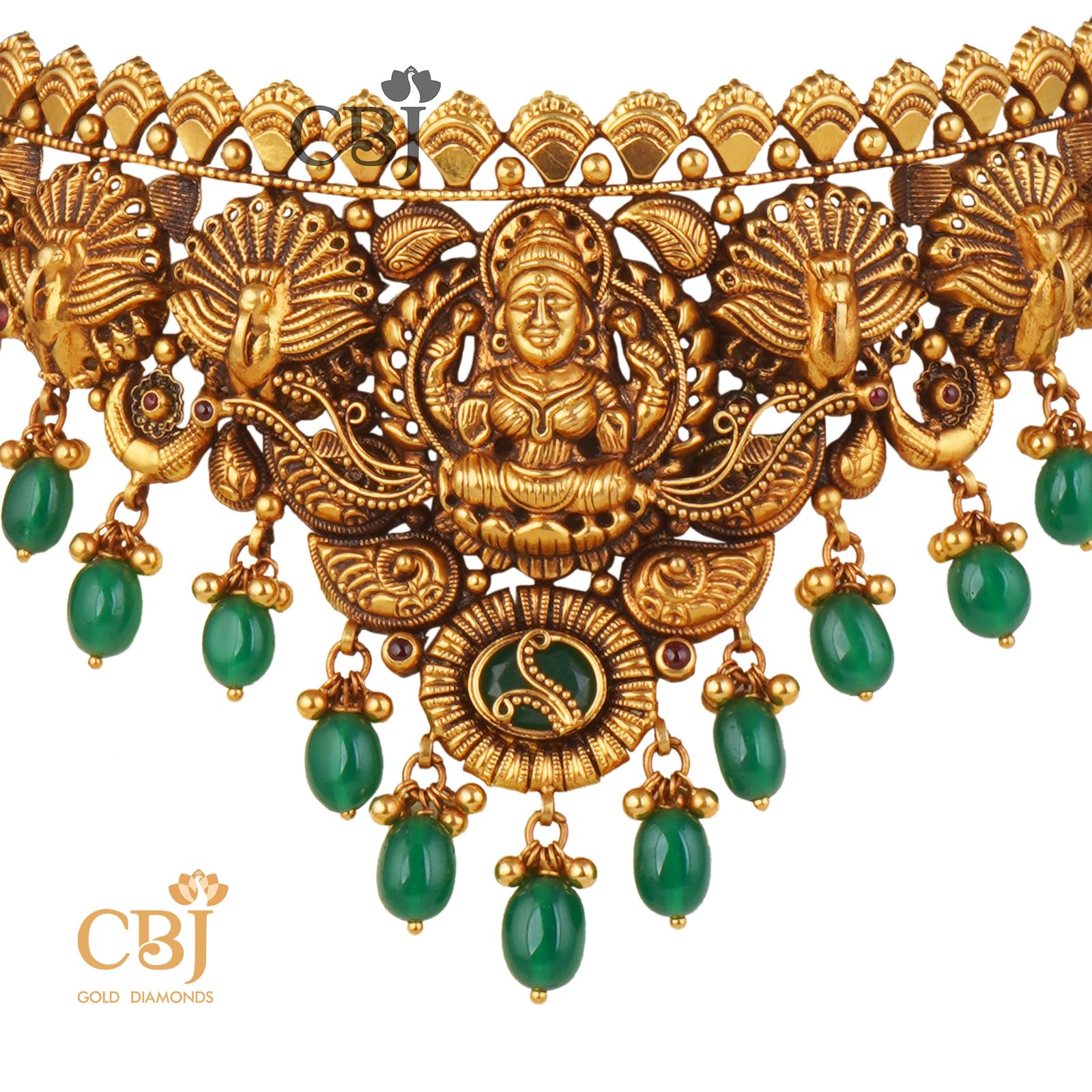 A V shaped nakashi choker suspended with emerald stones.