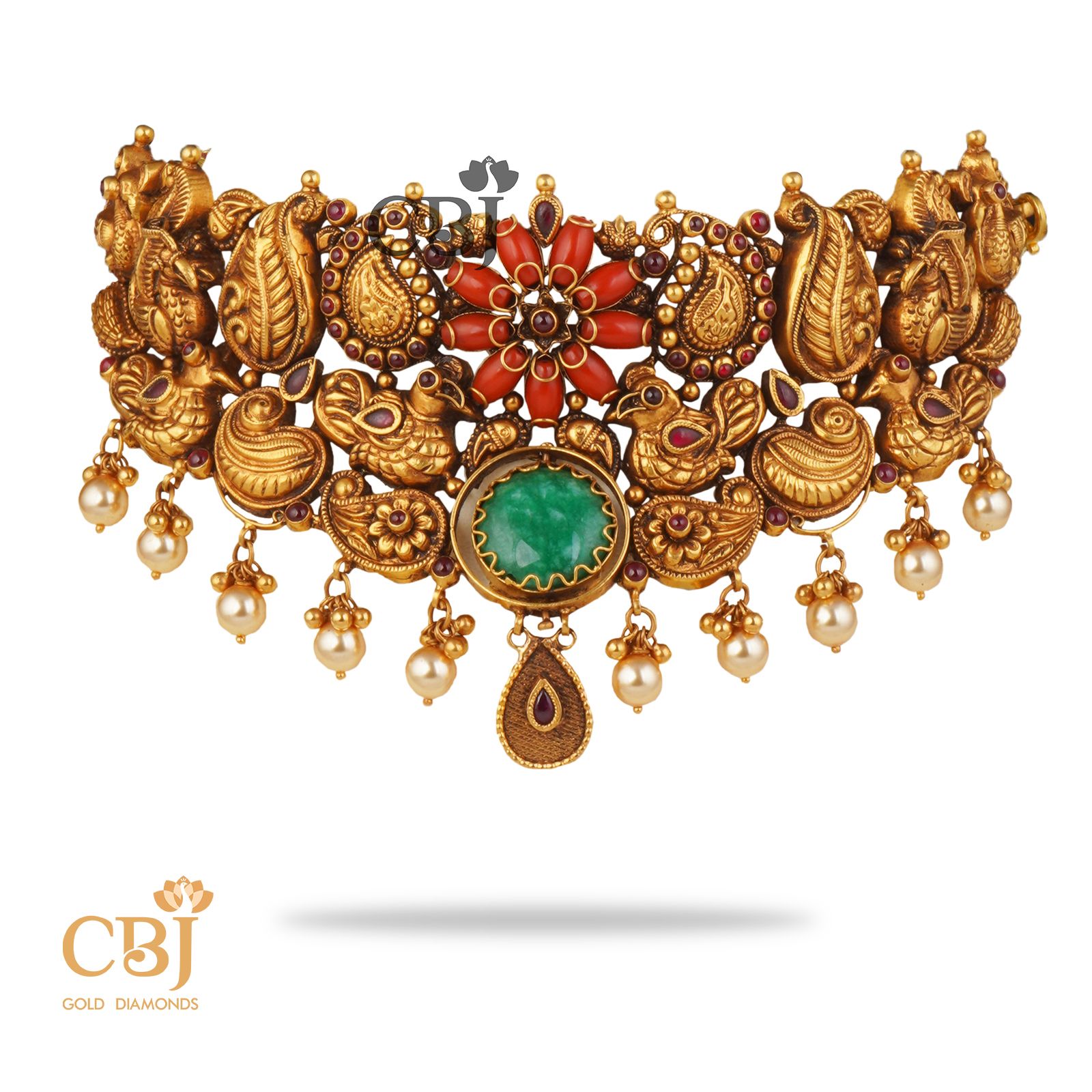 A stunning rotating designer choker featuring coral stones, emeralds and pearls.