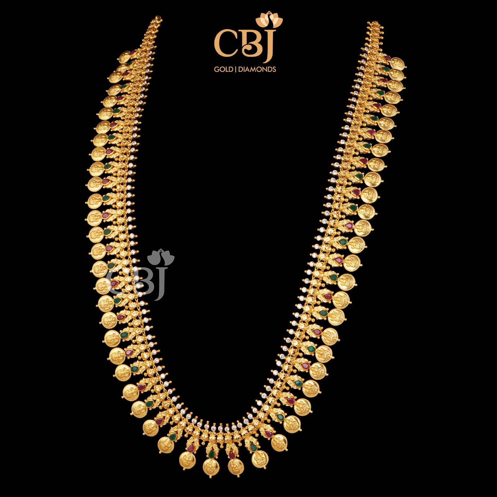 A unique kasumala in which each kasu is perfectly aligned with ruby and emerald stones.