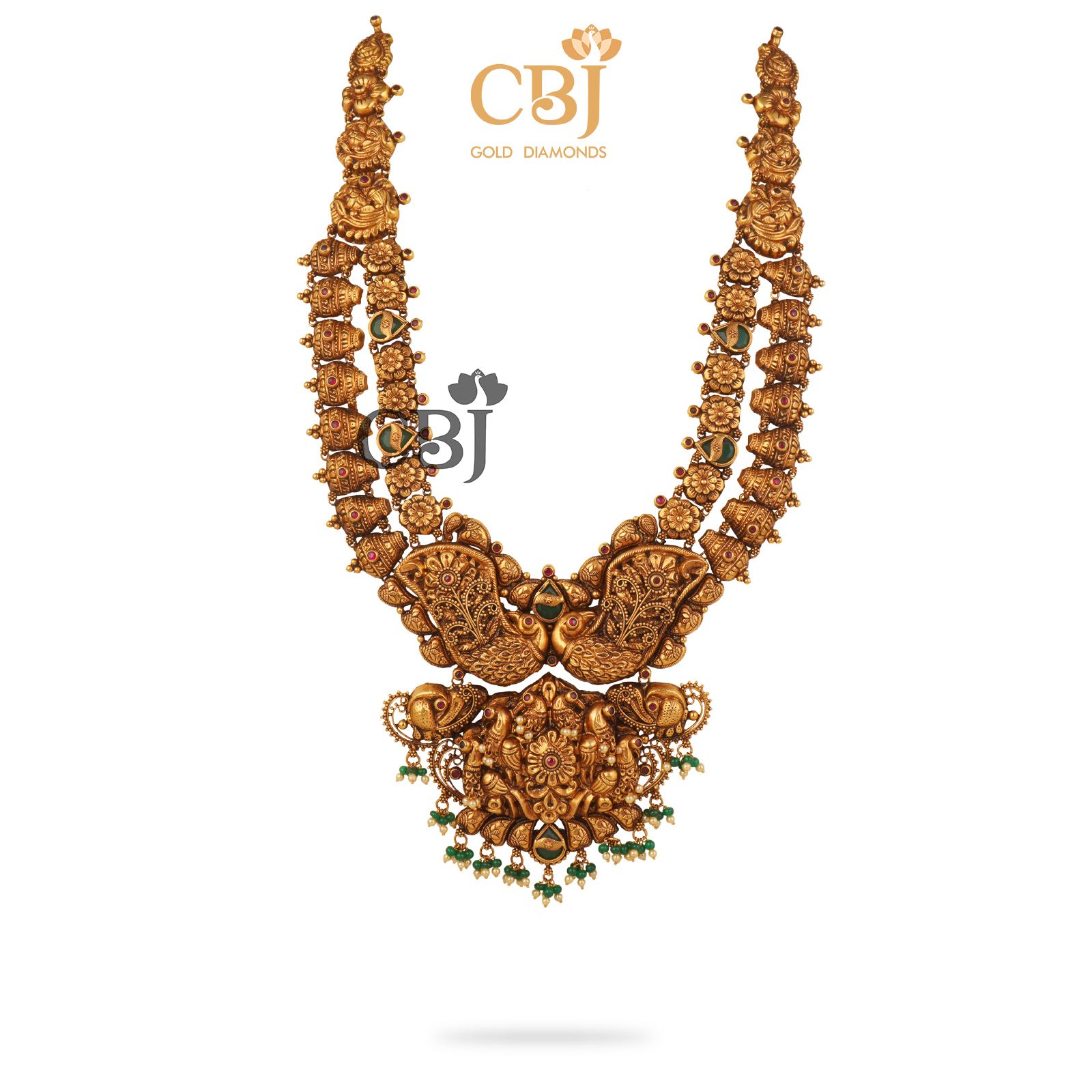 Antique 2 step nakashi haram suspended with emeralds and micro-pearls.