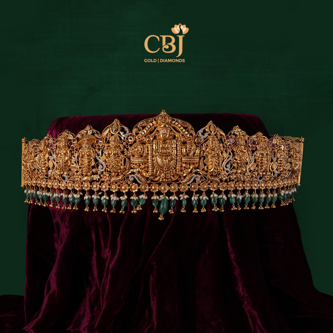 Antique Nakashi Vaddanam featuring a devotional design decorated with emeralds and micro-pearls.  Designer Nakashi Antique Vaddanam made for big occasions.