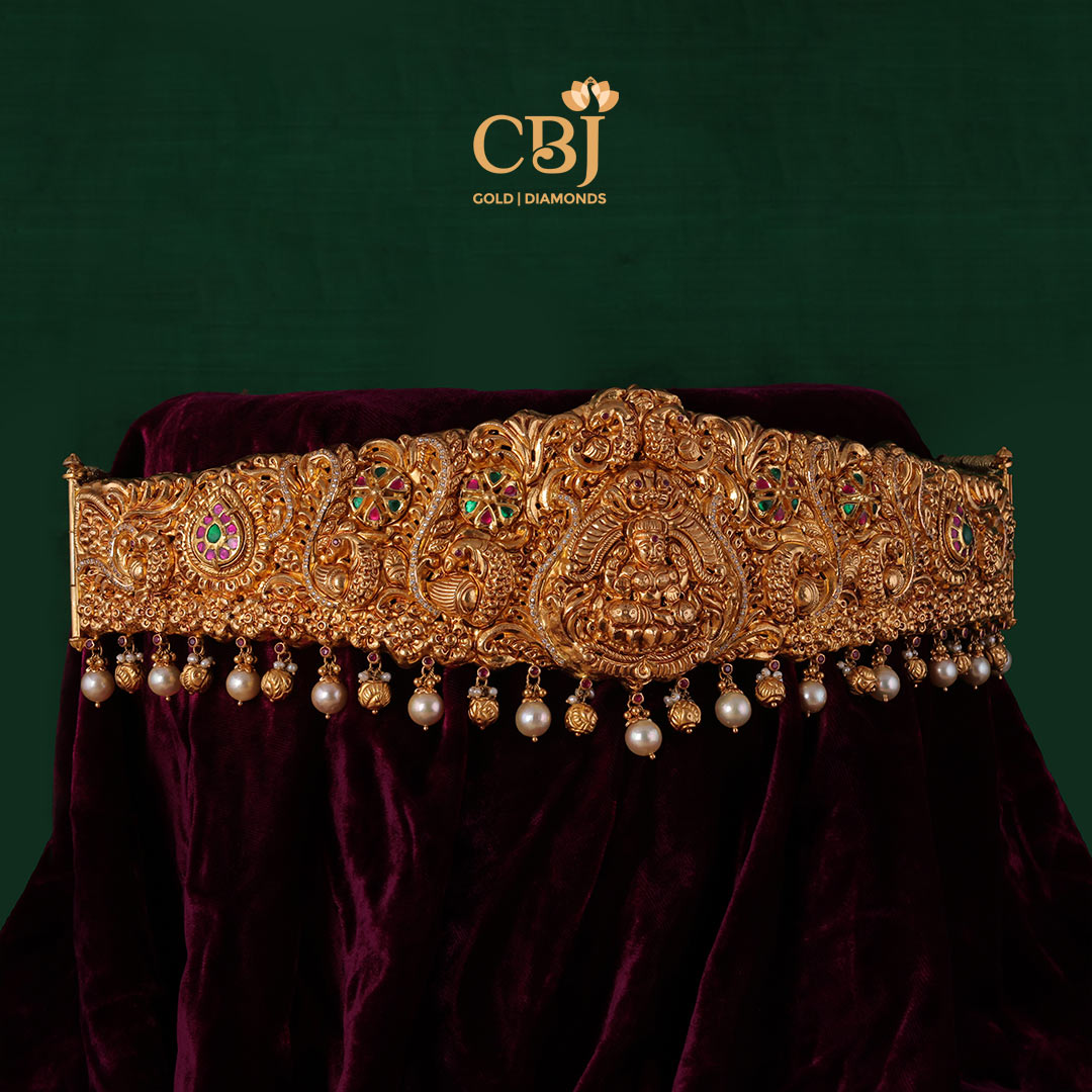 Heritage Nakashi vaddanam featuring pearl drops.