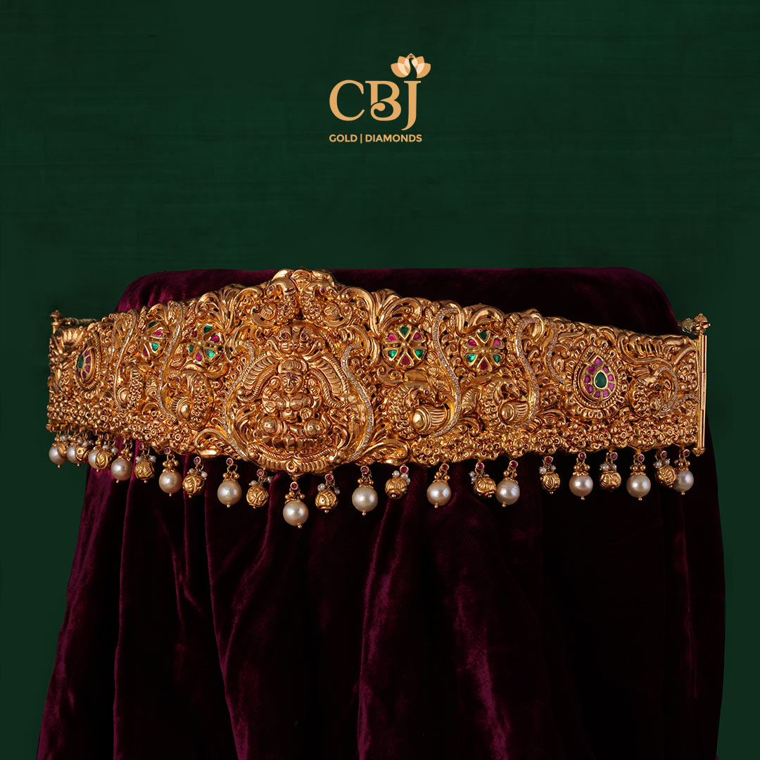 Heritage Nakashi vaddanam featuring pearl drops.