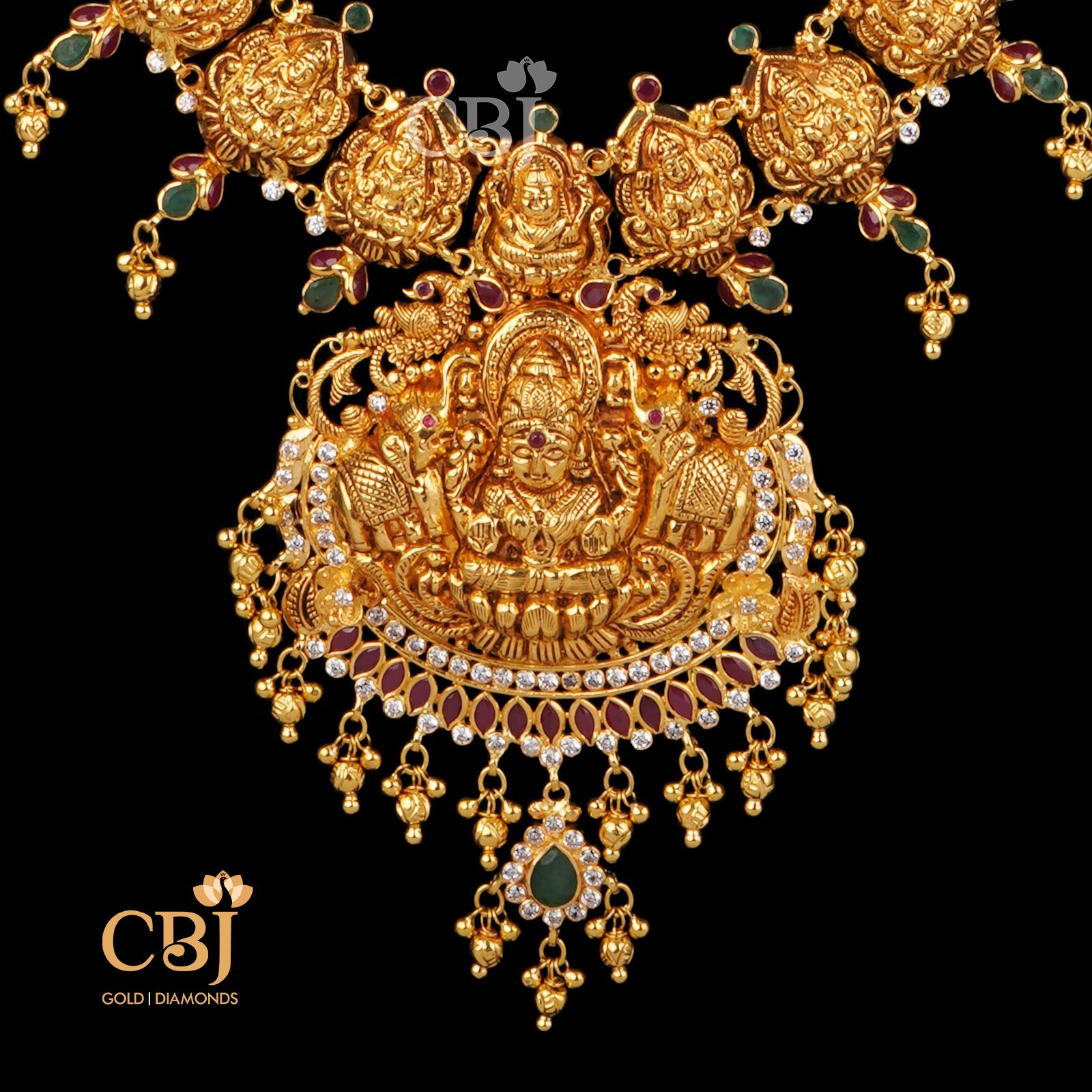 Long light weight haram featuring cz and emerald stones.