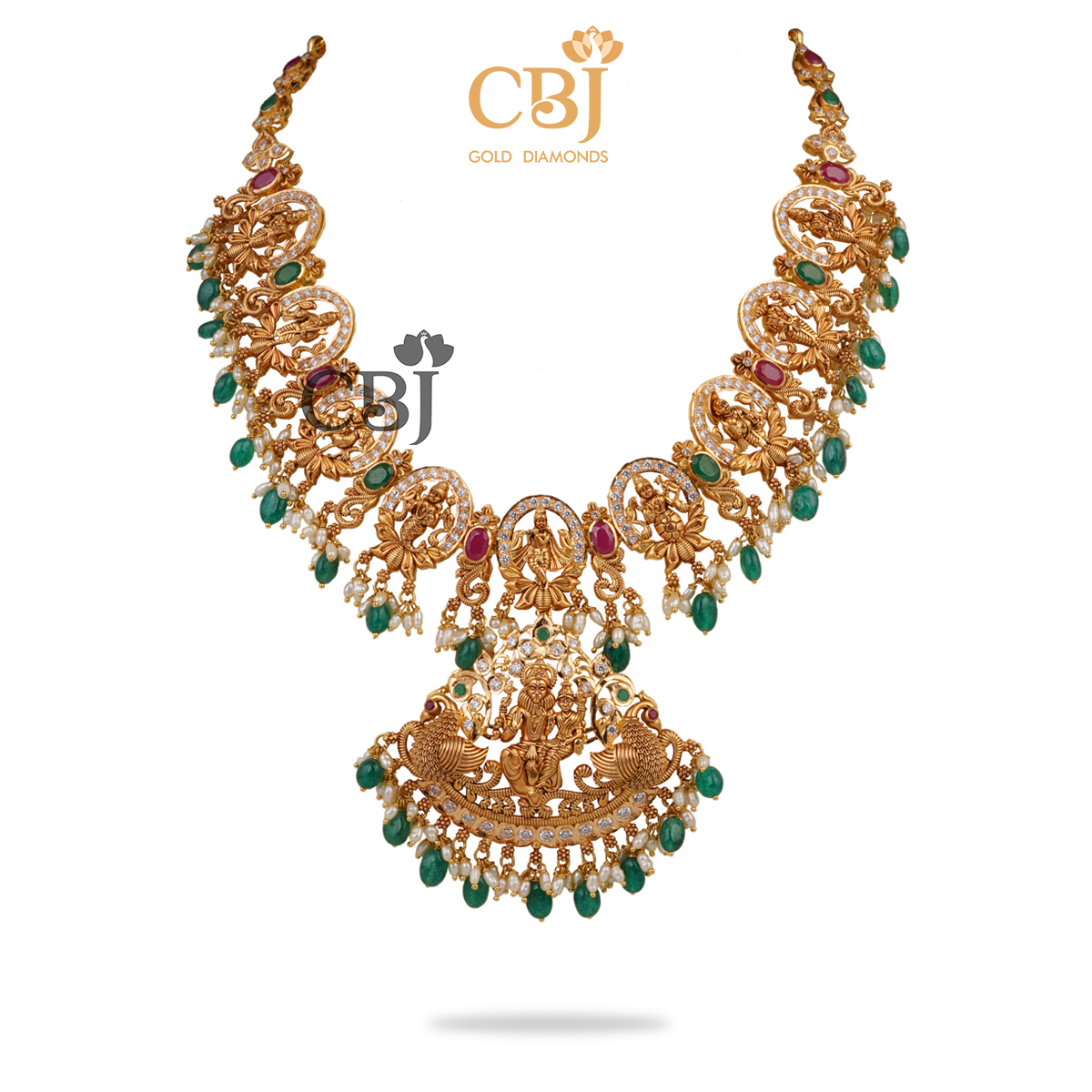 A handcrafted CZ pachi short necklace decorated with rubies, micro-pearls and emerald drops. 