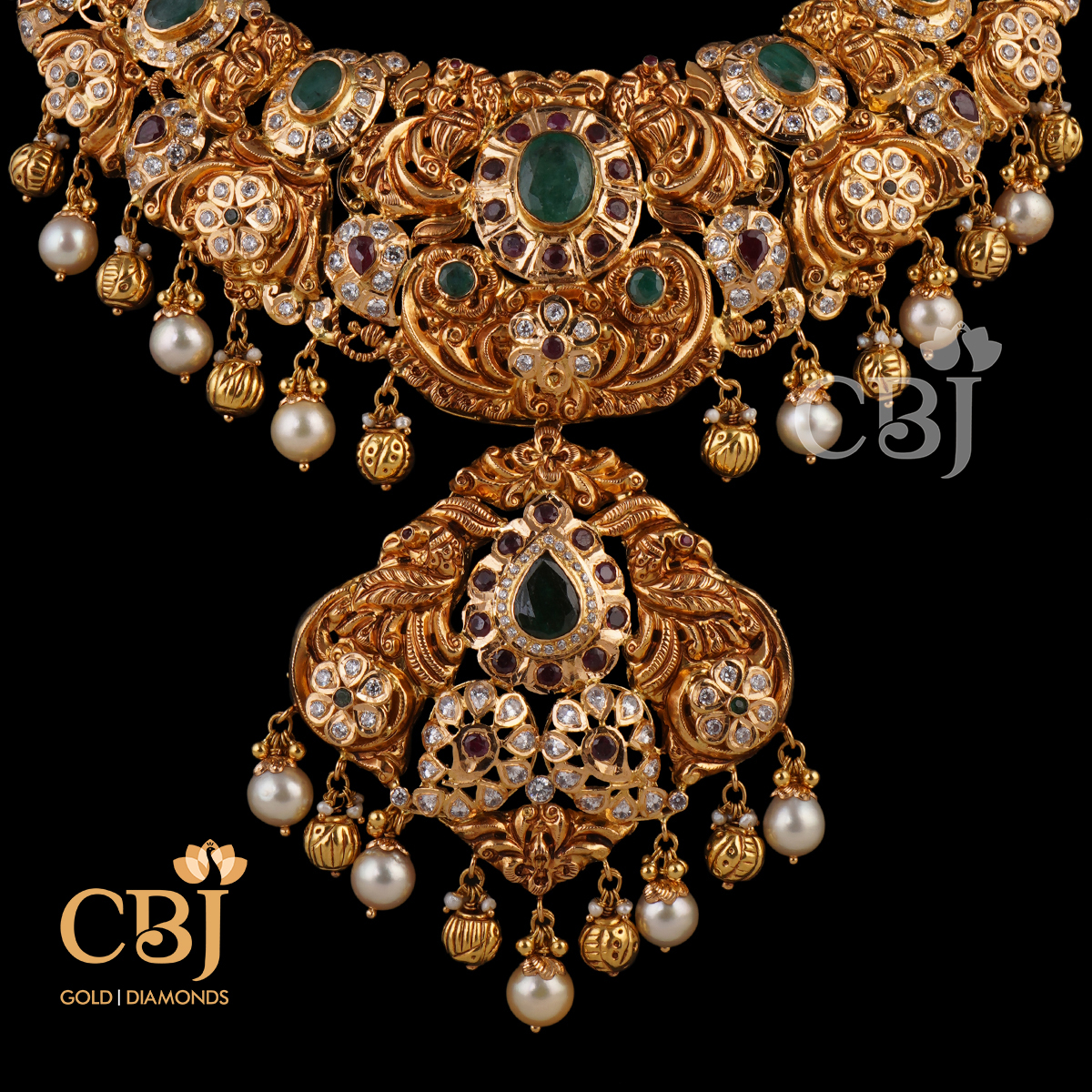 A slender CZ pachi U necklace decorated with rubies