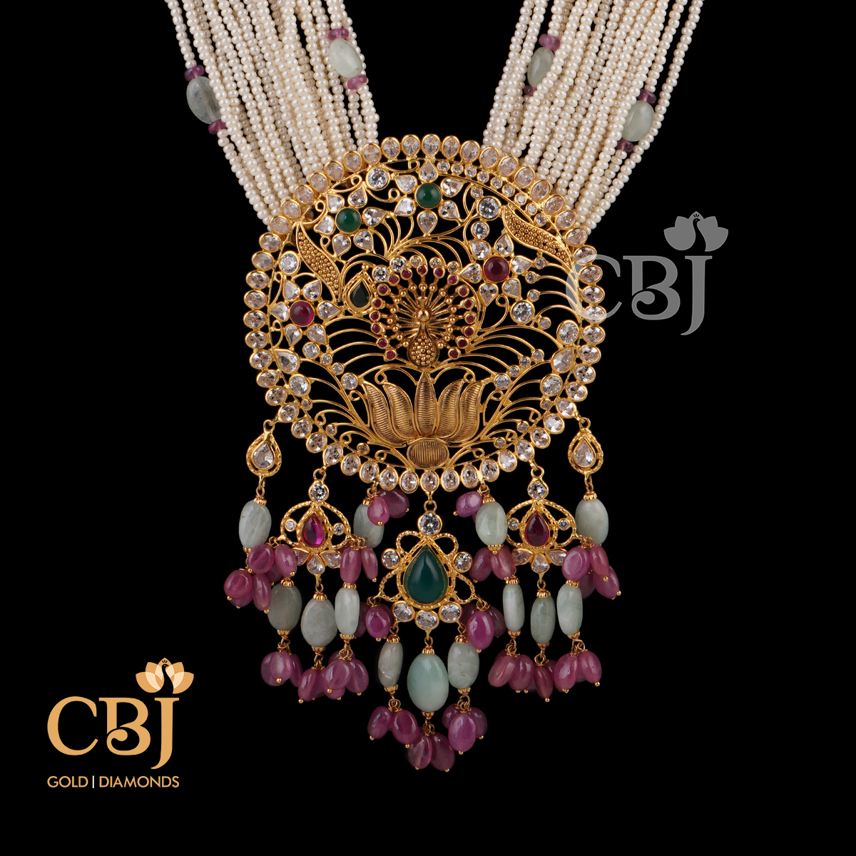 A feather light haram featuring pearl bunch mala with a lotus peacock pendant.