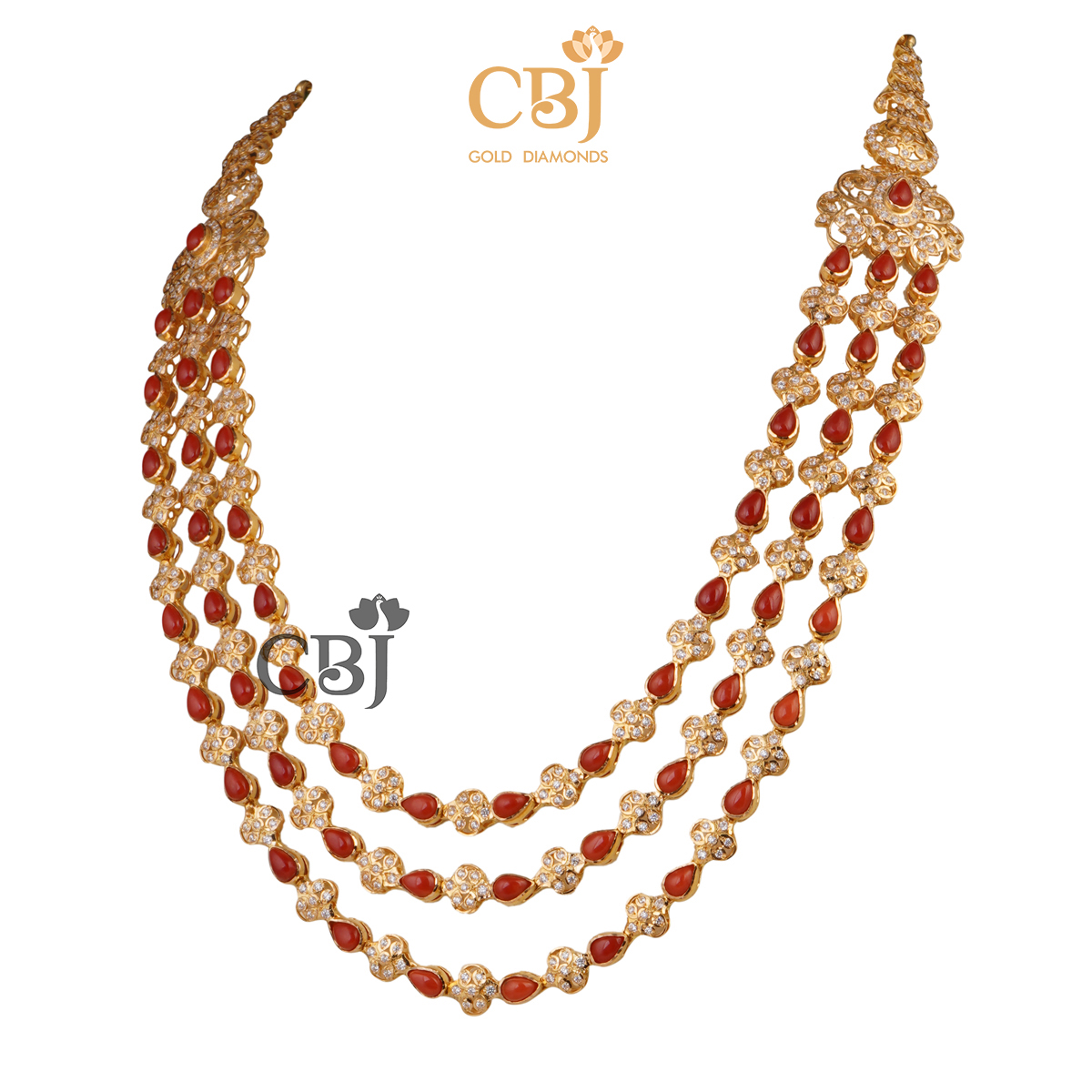 A 3 step CZ haram studded with coral stones in a symmetrical fashion.