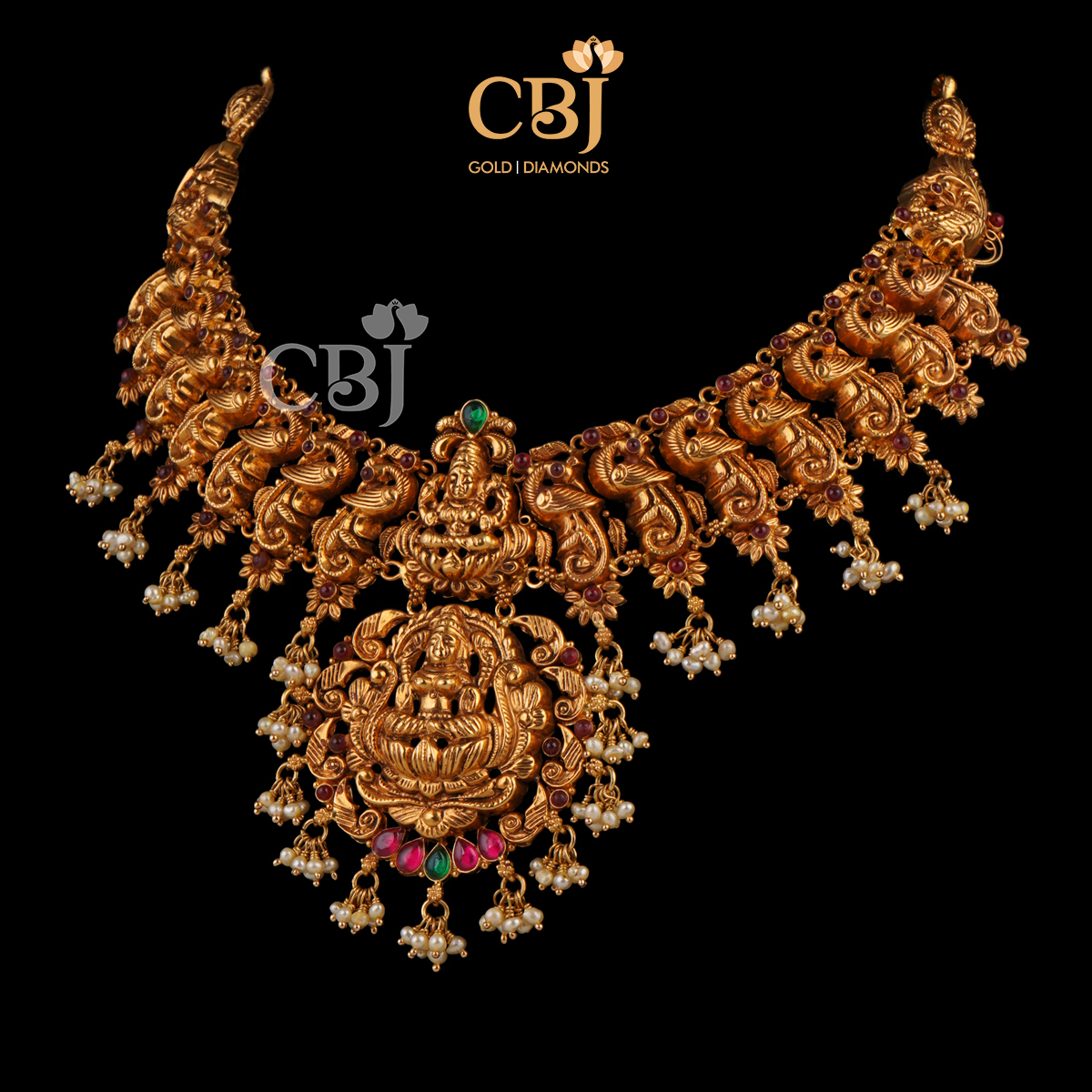 Antique kante with peacock motifs featuring rubies and micro-pearls.