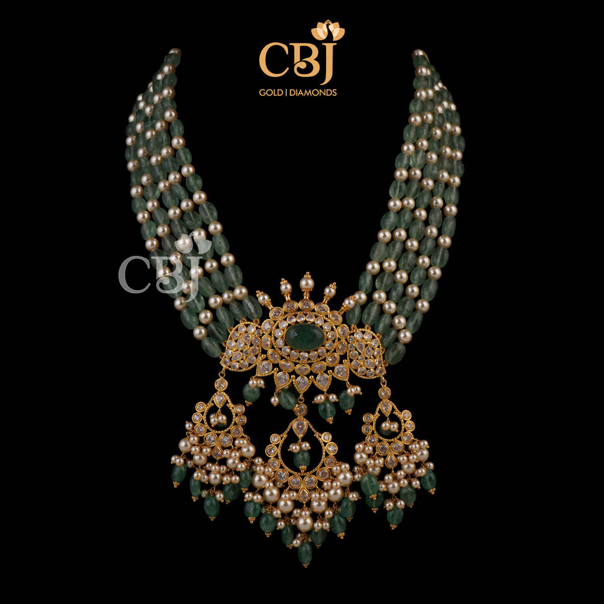 An ultra light weight design featuring emeralds and pearls.