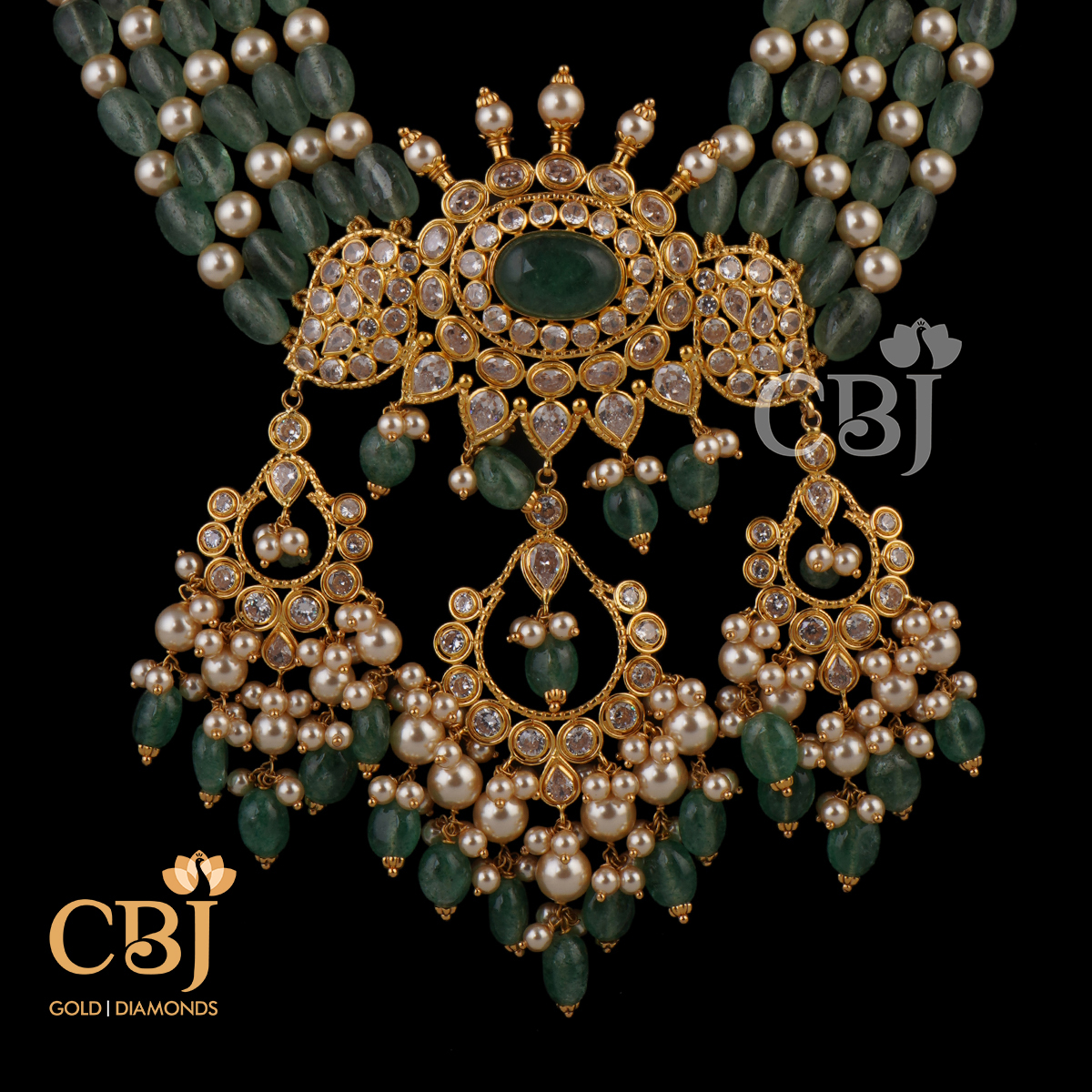 An ultra light weight design featuring emeralds and pearls.