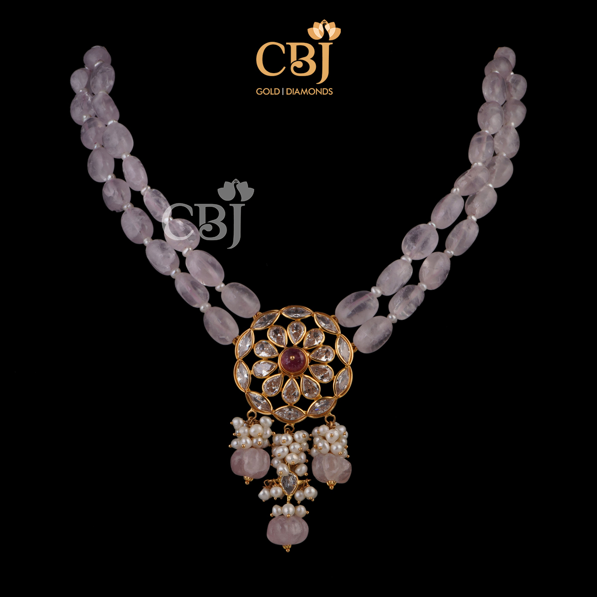 An ultra light weight necklace featuring rubies and pearls.