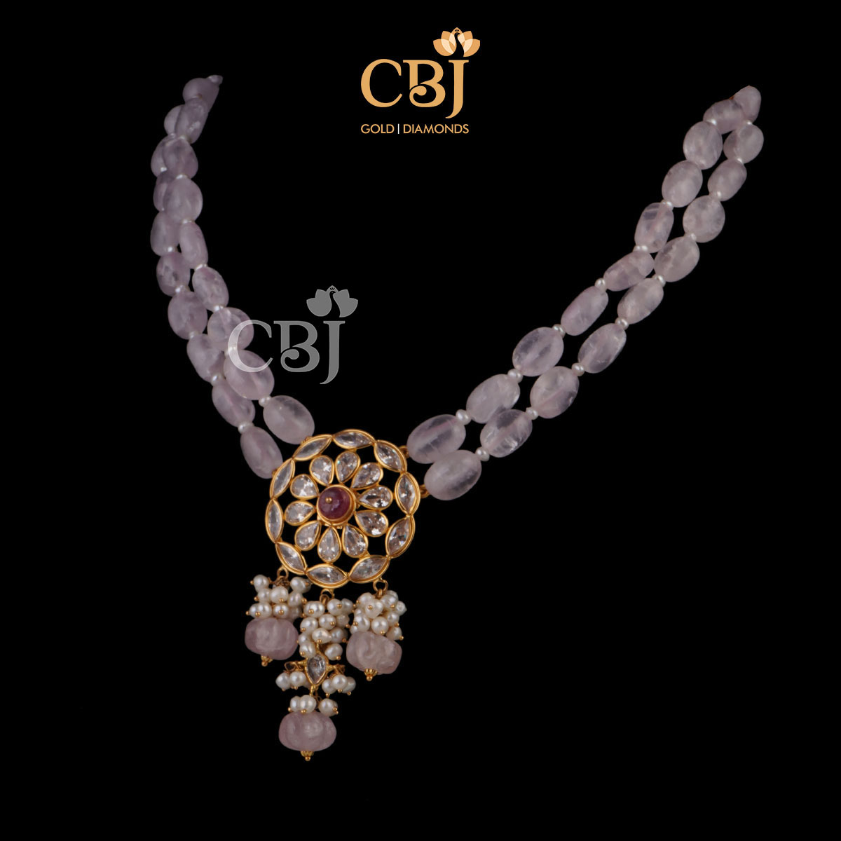 An ultra light weight necklace featuring rubies and pearls.