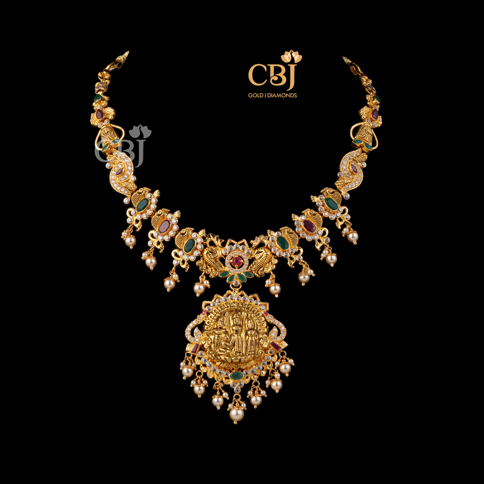 A traditional necklace featuring rubies, emeralds, pearls and CZ's.