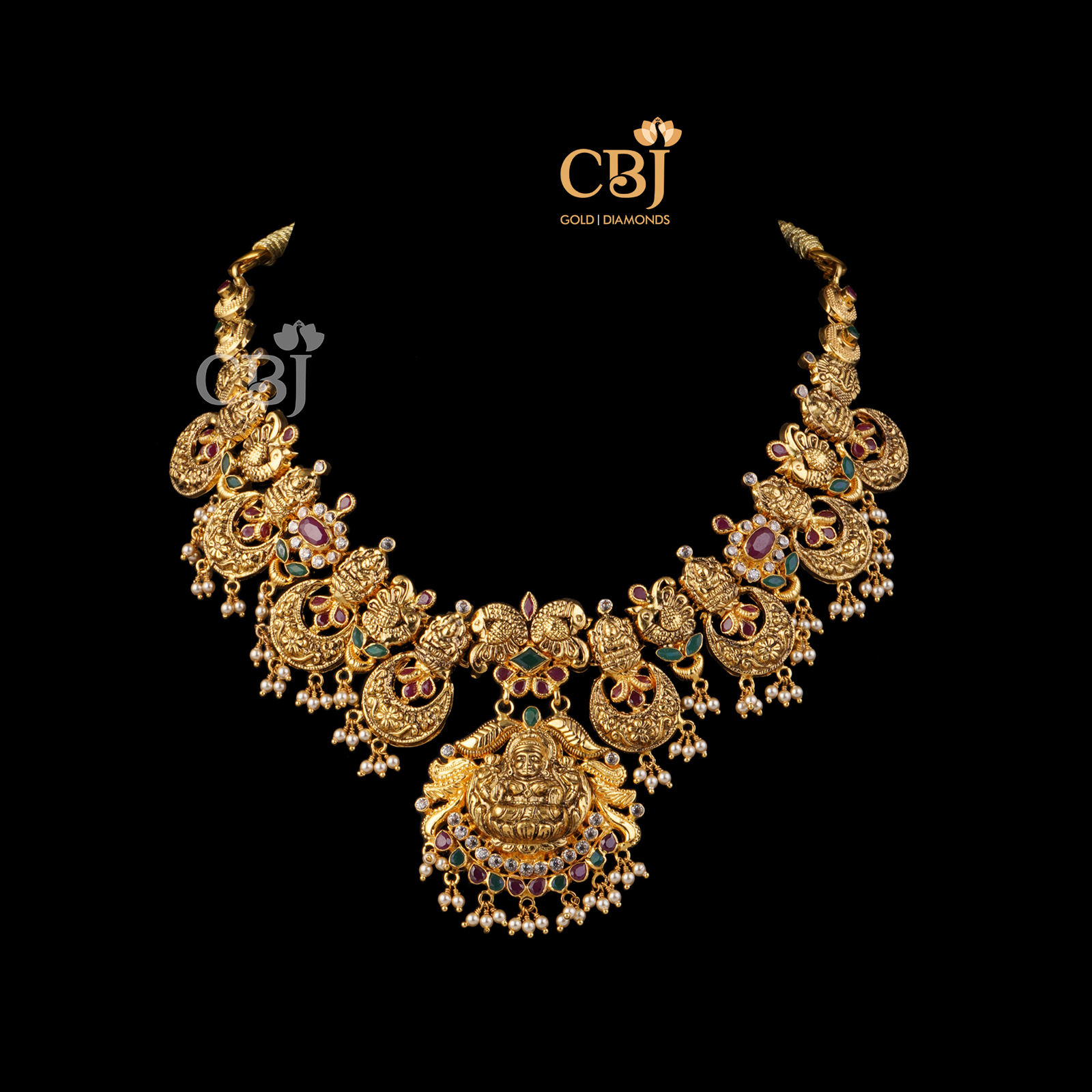 Light weight chand necklace featuring rubies, emeralds and micro-pearls.