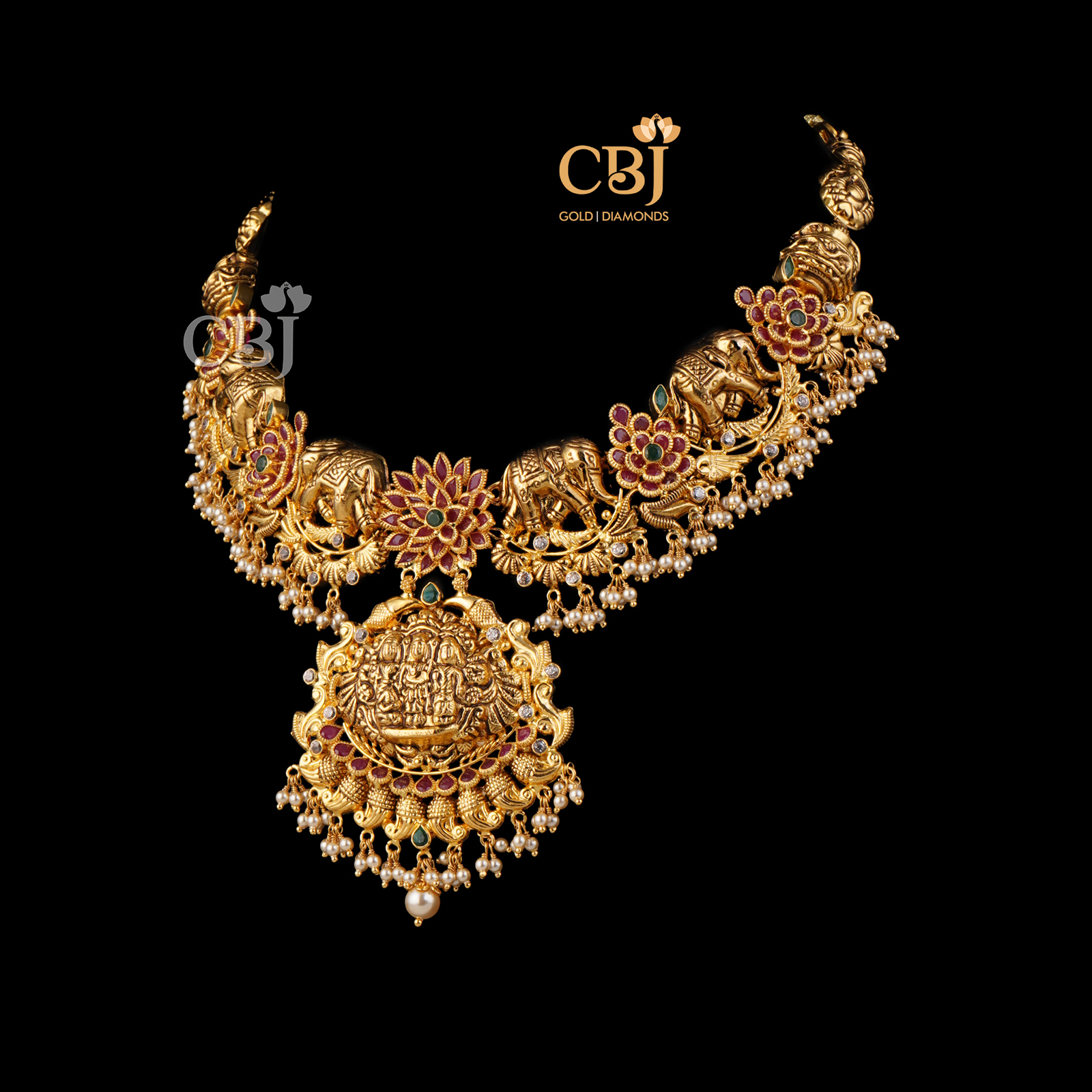 A one of a kind light weight ramparivar necklace featuring elephant motifs; studded with micro-pearls.