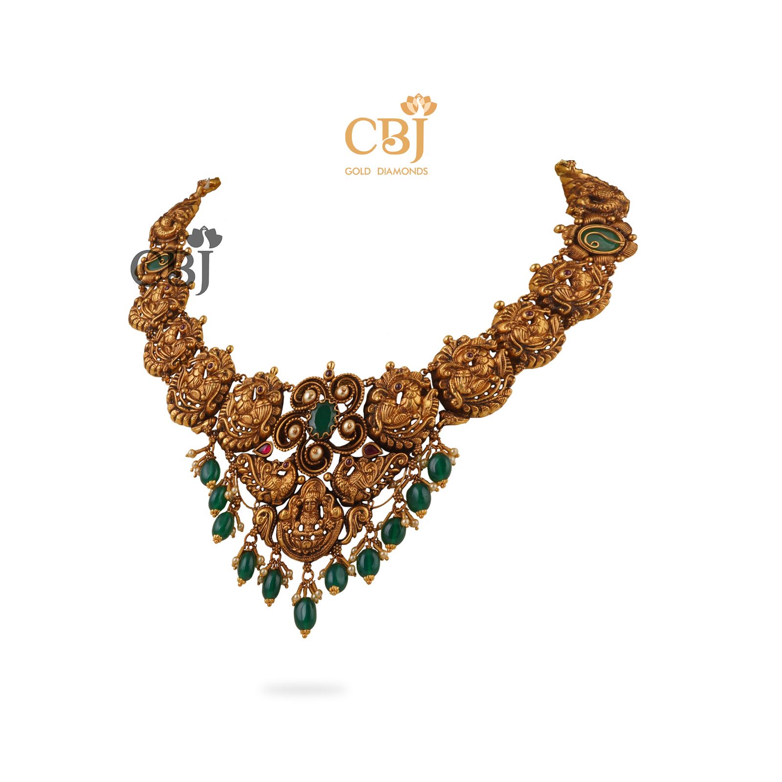 Unique and antique. A stunning nakashi short necklace with suspended emerald drops.