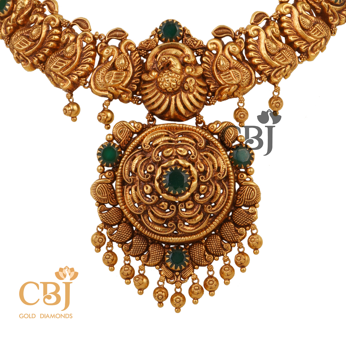 Antique nakashi necklace studded with emerald stones