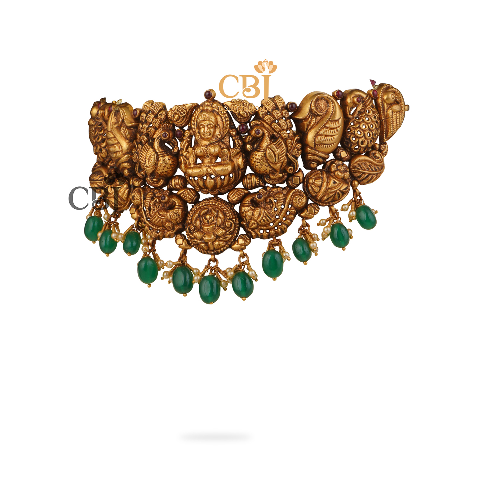 A deep nakas choker featuring a heavy antique design with emerald stones.