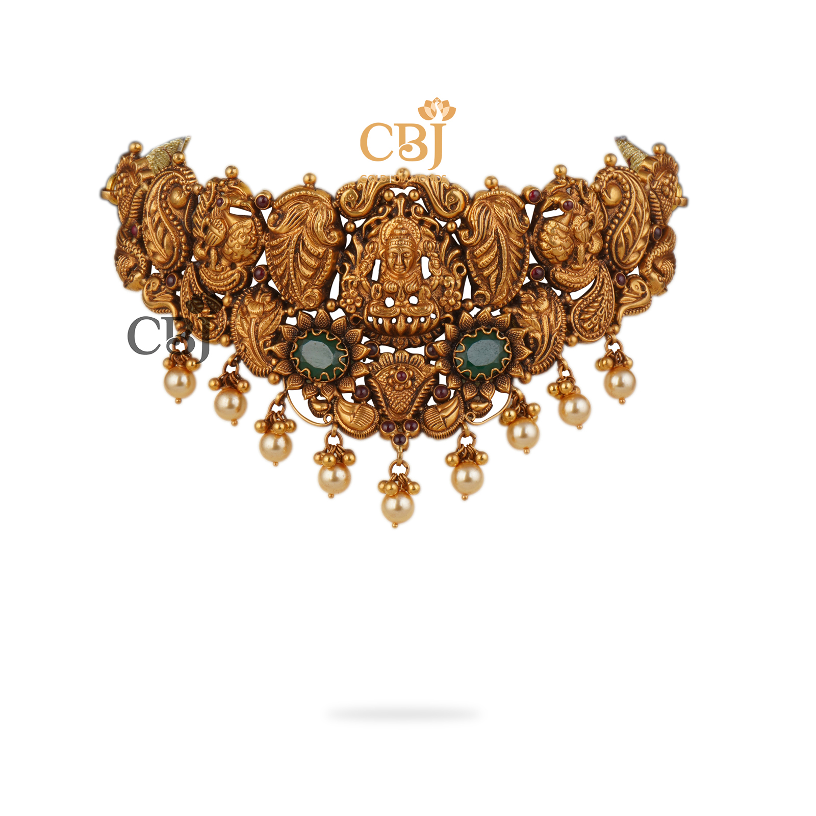 Antique nakashi choker highlighted by two stunning emerald stones and suspended emeralds.