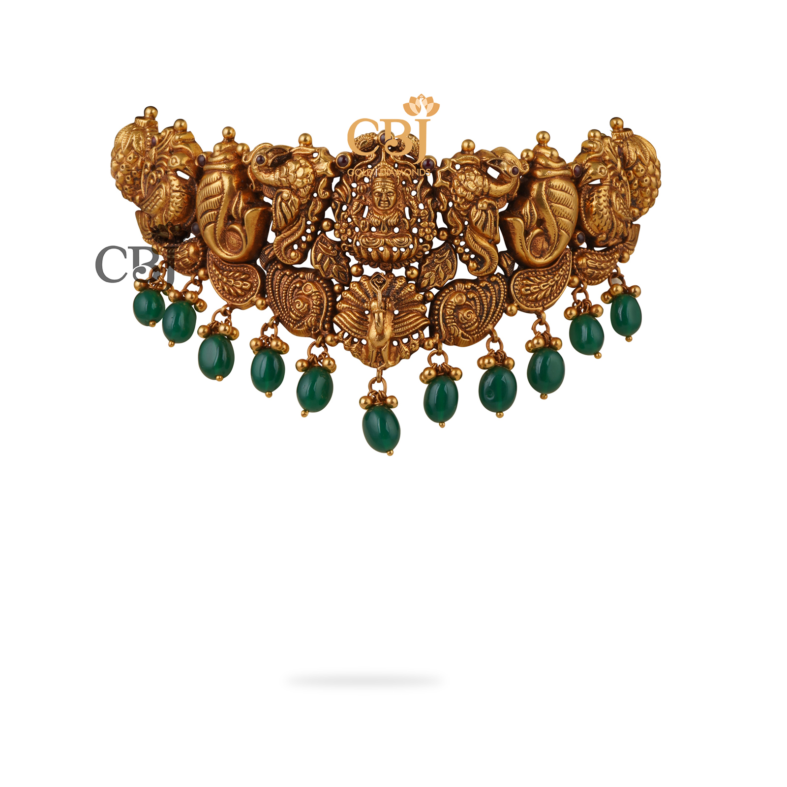 An antique nakashi choker with peacock motifs featuring suspended emeralds.