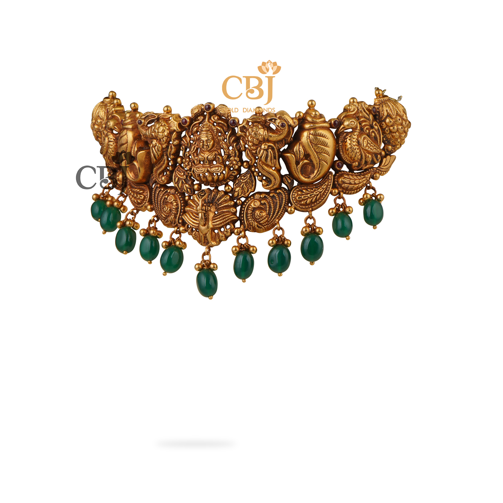 An antique nakashi choker with peacock motifs featuring suspended emeralds.