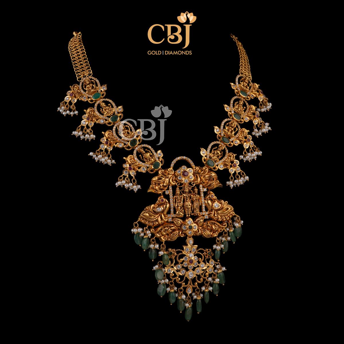Unique CZ pachi Ramparivar necklace featuring emerald and pearl drops.