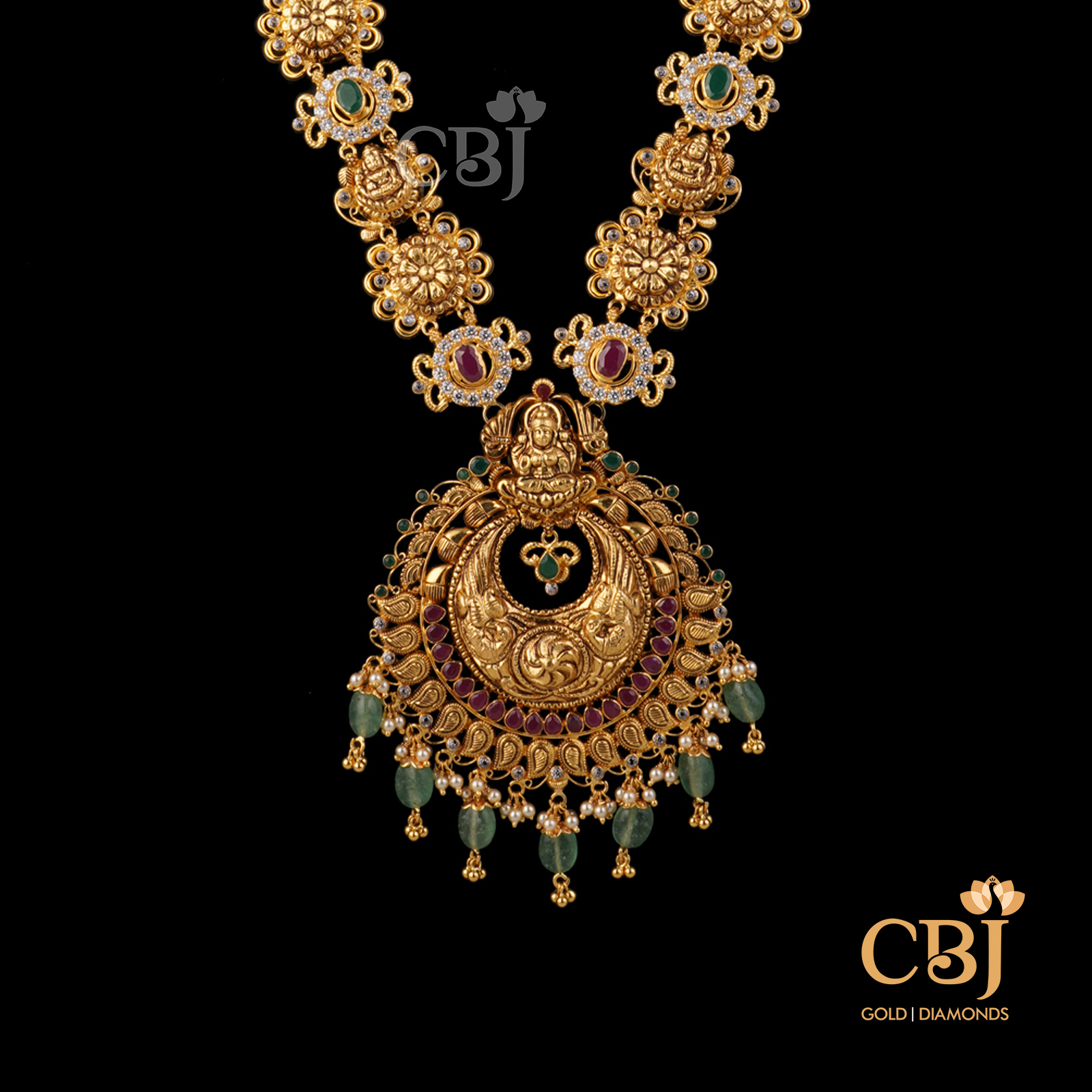 A light weight ruby emerald haram featuring zambian emeralds.