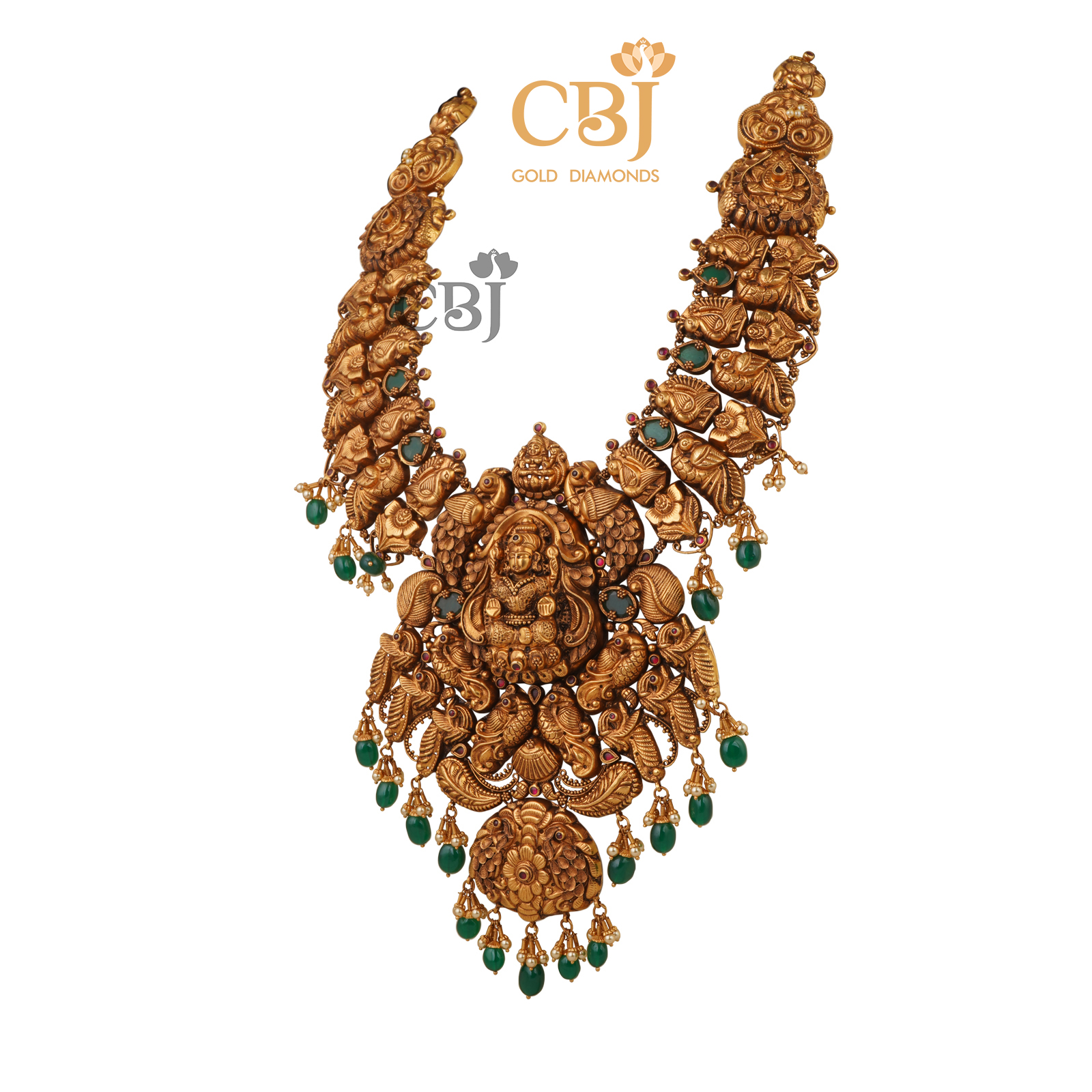 A grand bridal antique nakashi haram decorated with the finest emerald stones.