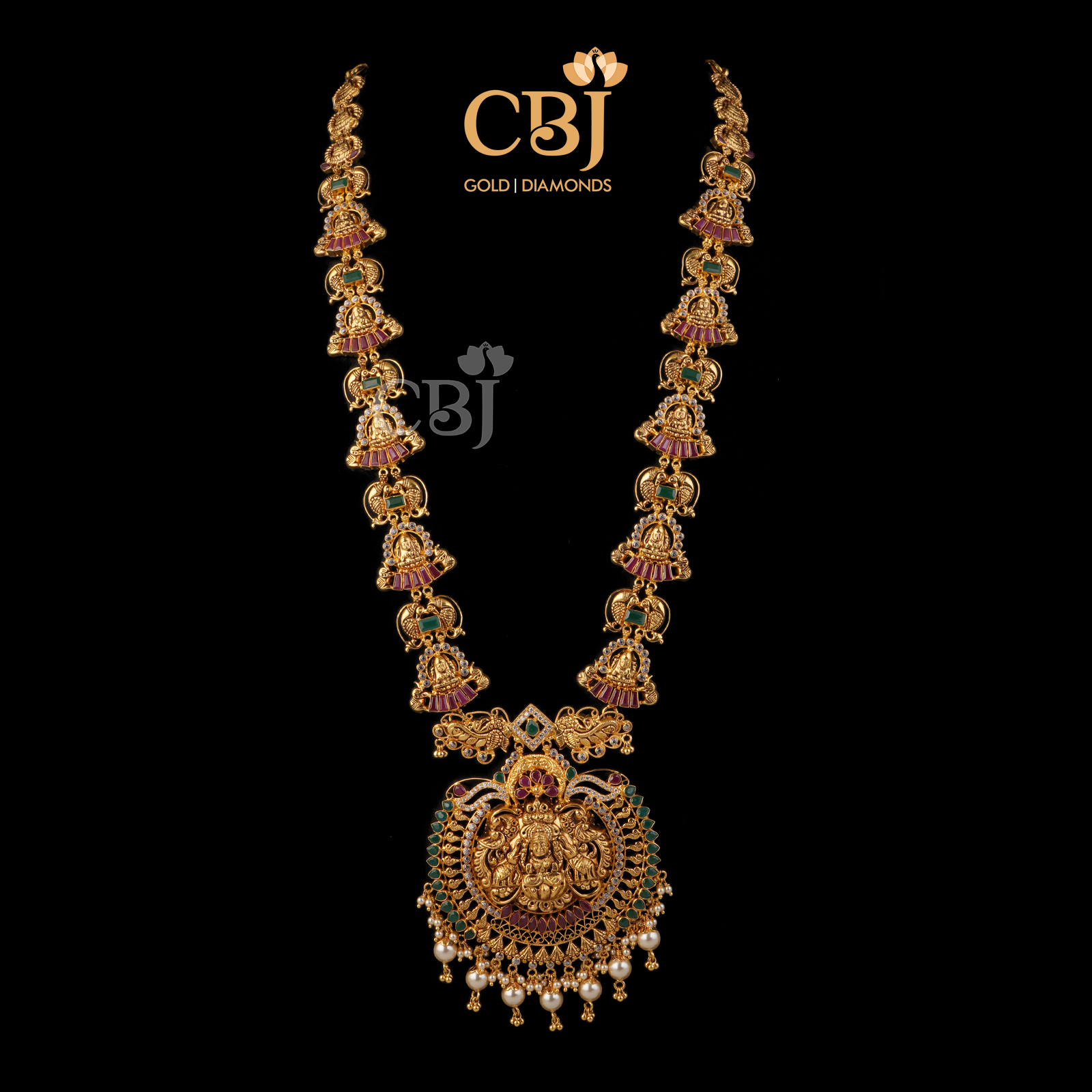 A light weight haram featuring rubies, emeralds and pearls.