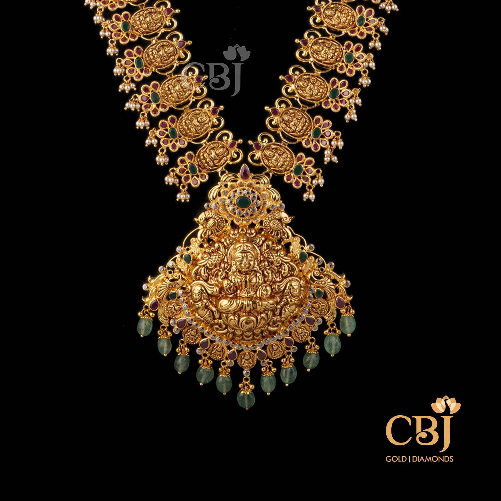 A bridal ruby emerald haram featuring zambian stones.